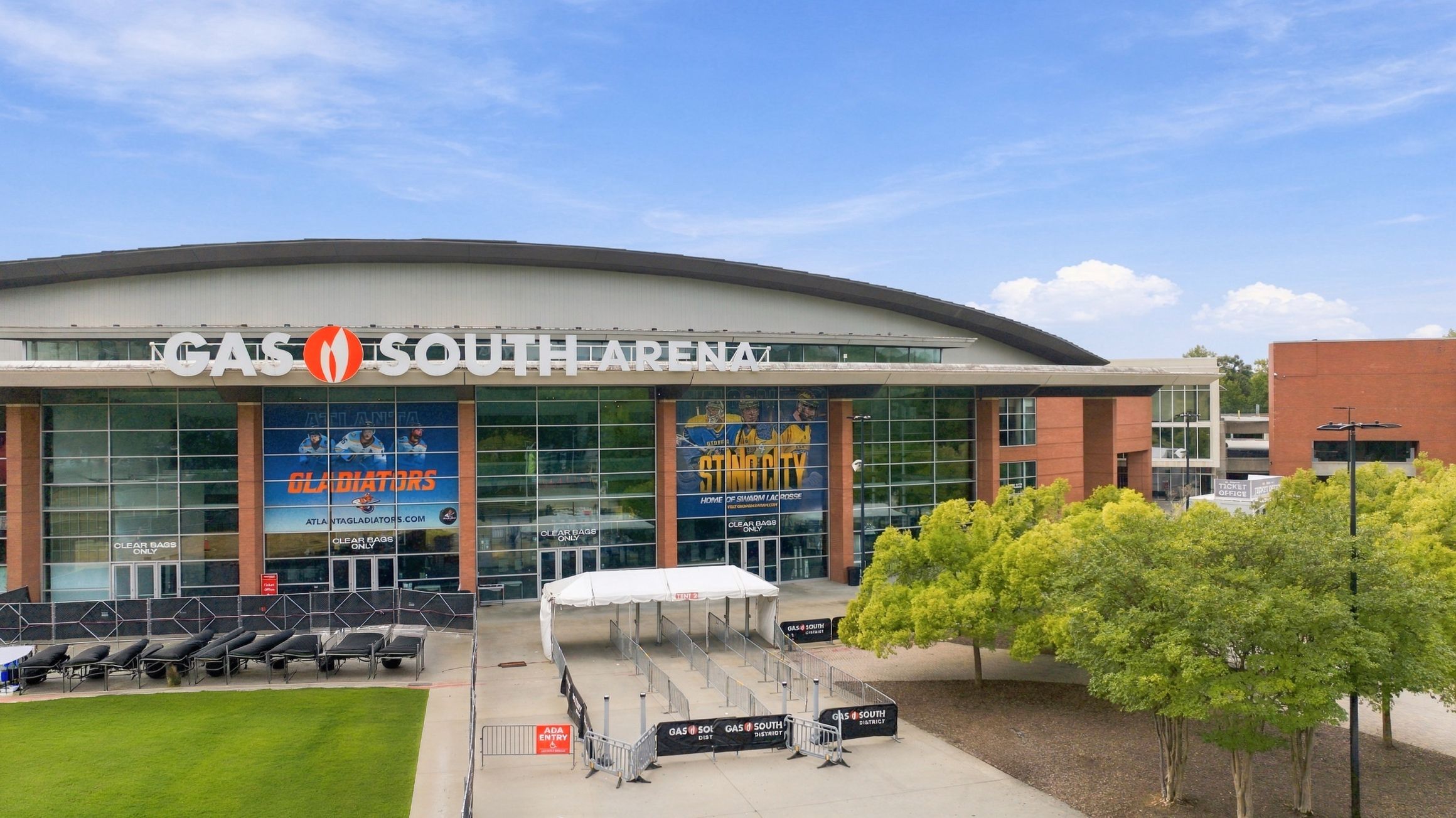 Gas South Arena exterior in Duluth, GA near Alford at Bethesda community with glass facade and event entrance