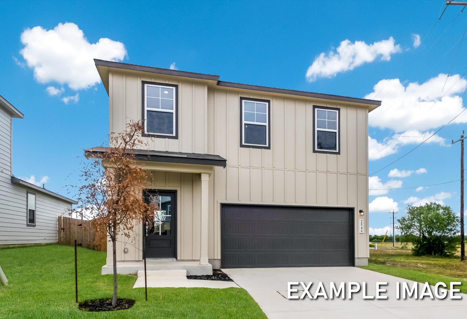 Modern two-story The Trinity A home elevation featuring beige siding, black trim, two-car garage, covered porch, and landscaped yard in San Antonio