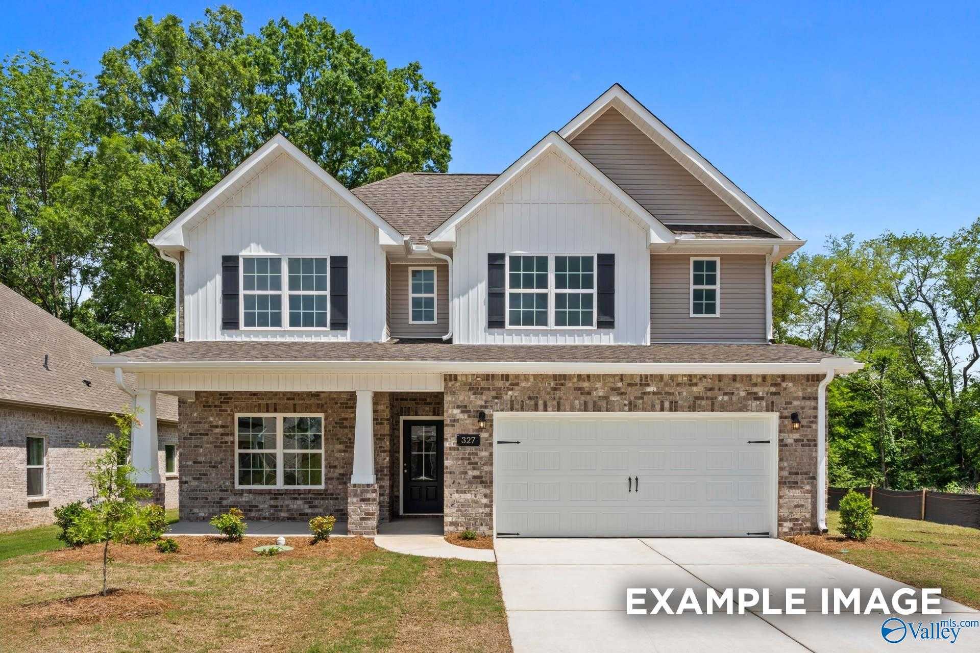 Modern two-story 4-bedroom home with brick accents, 2-car garage, and covered porch in Walker's Hill, Meridianville, Alabama - Davidson Homes Shelby C