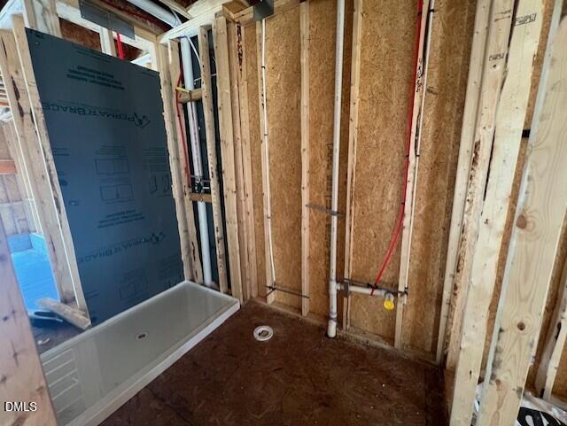 Bathroom plumbing and shower stall installation in progress for The Willow D floor plan at Wellers Knoll in Lillington, NC.
