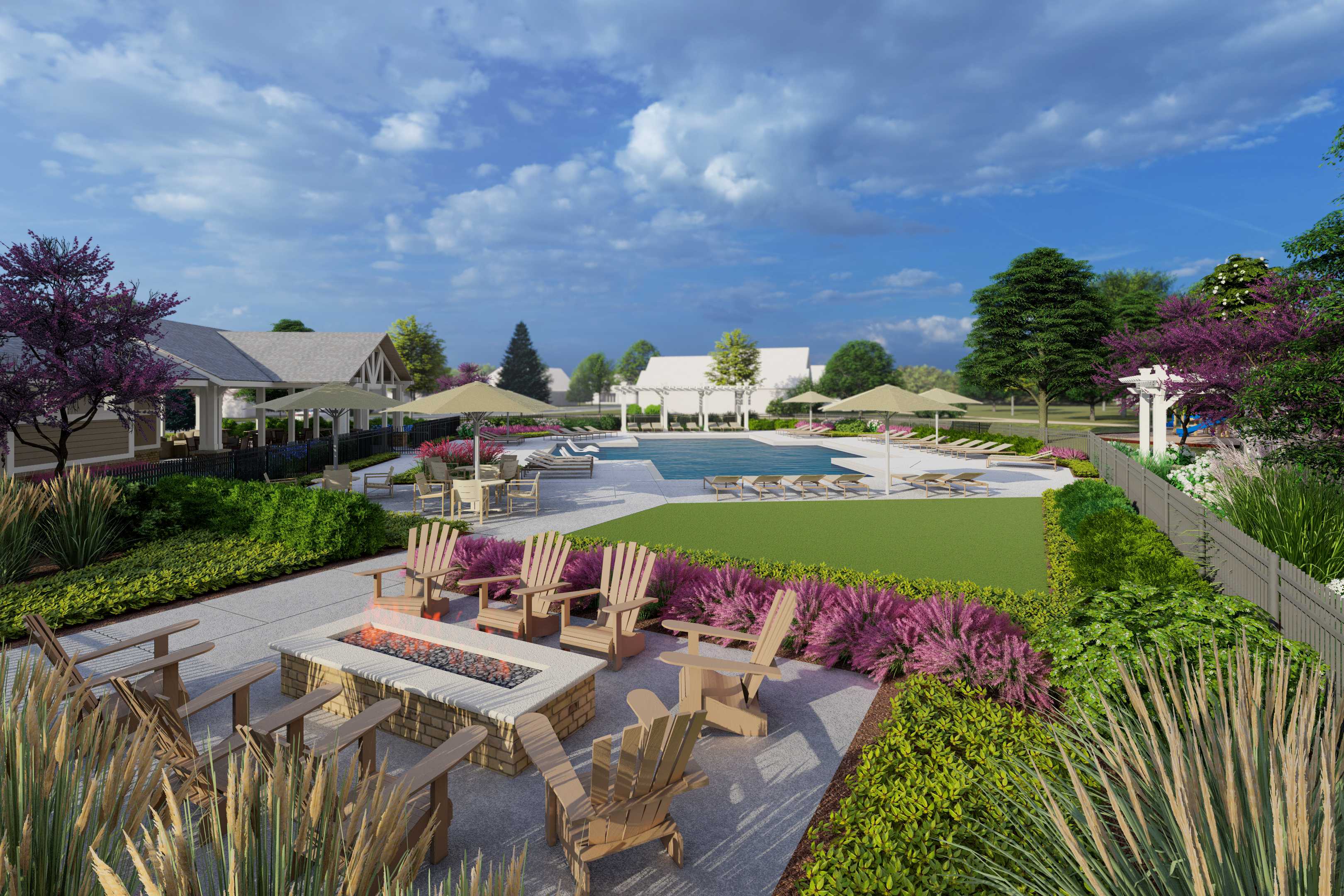 Resort-style pool at Creekside in Harvest Alabama with fire pit lounge, Adirondack chairs, and lush landscaping