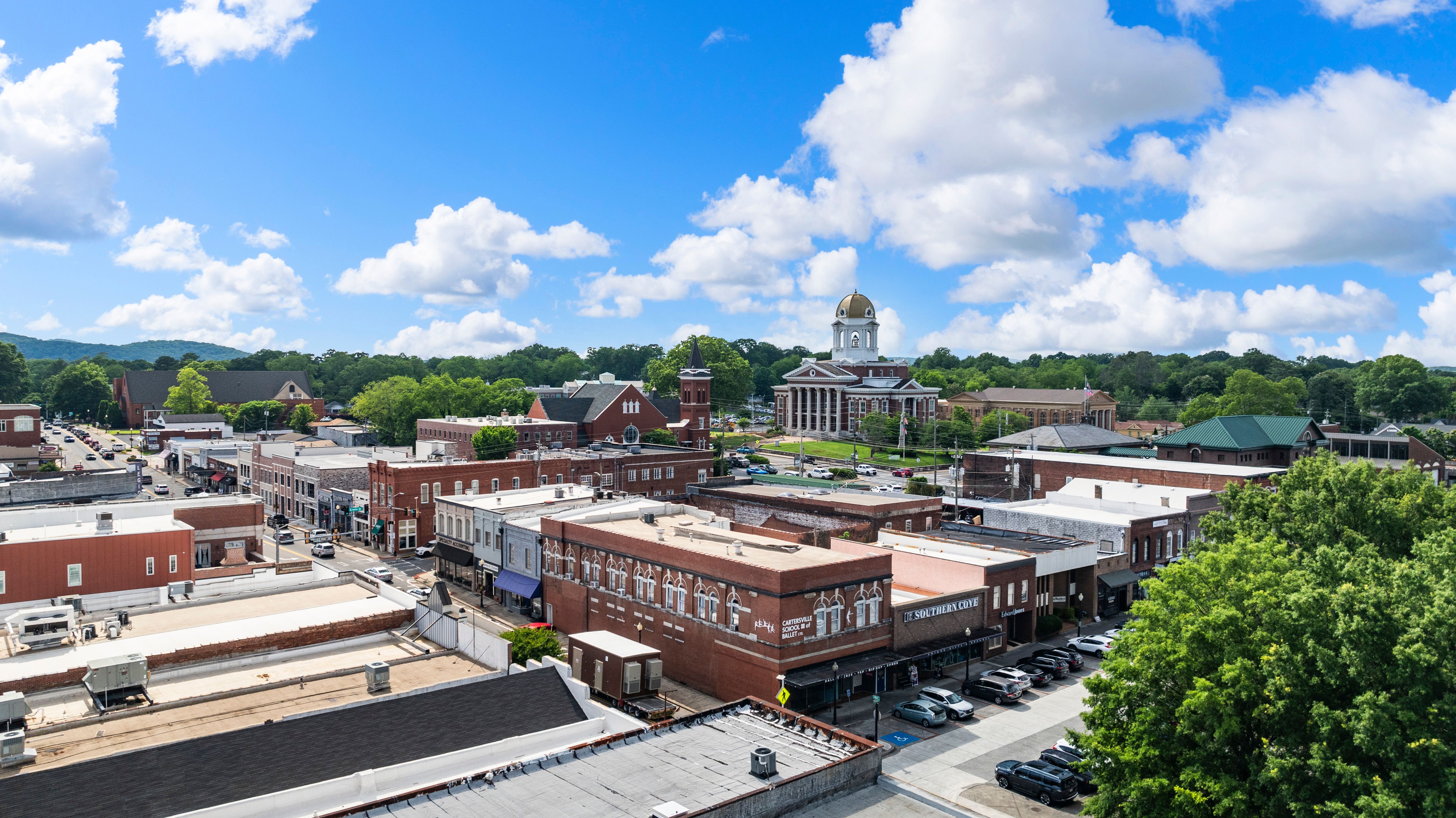 Aerial view of downtown Cartersville, Georgia with historic buildings and the courthouse near Greene Farm community.