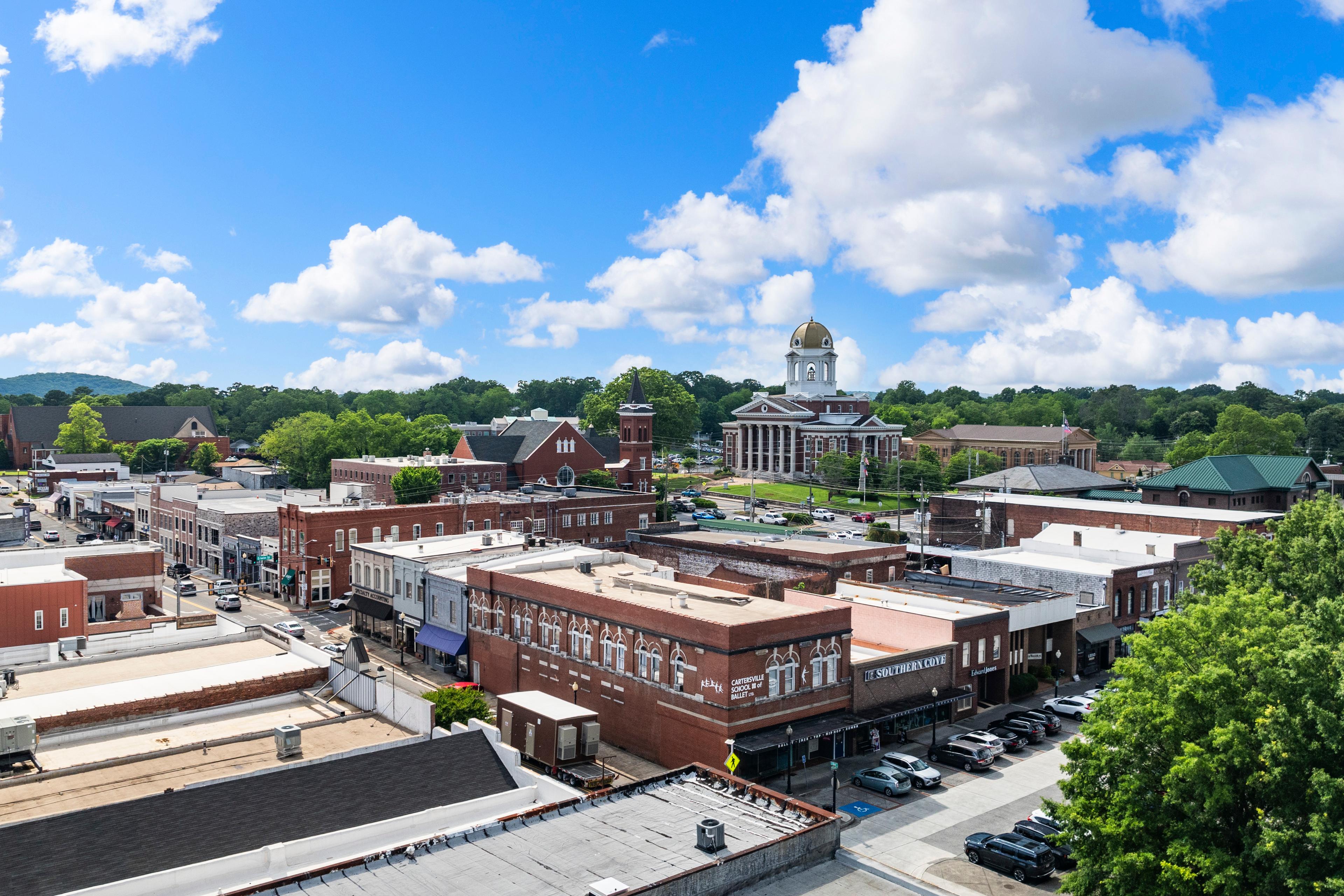 Aerial view of downtown Cartersville, Georgia with historic buildings and the courthouse near Greene Farm community.