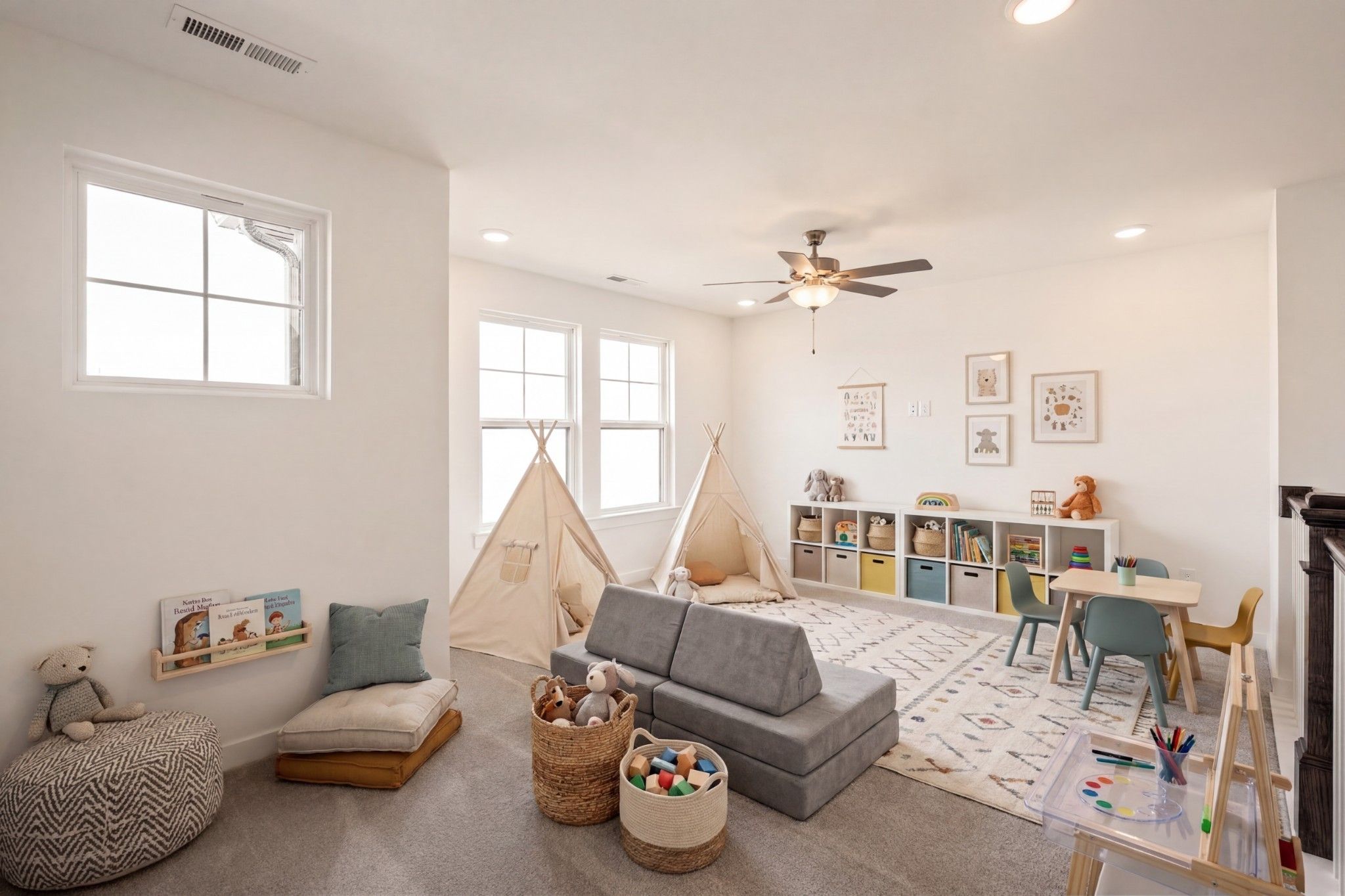 Bright, spacious playroom with play tents and storage in a Davidson Homes Willow D floor plan in Mt. Juliet, Tennessee.