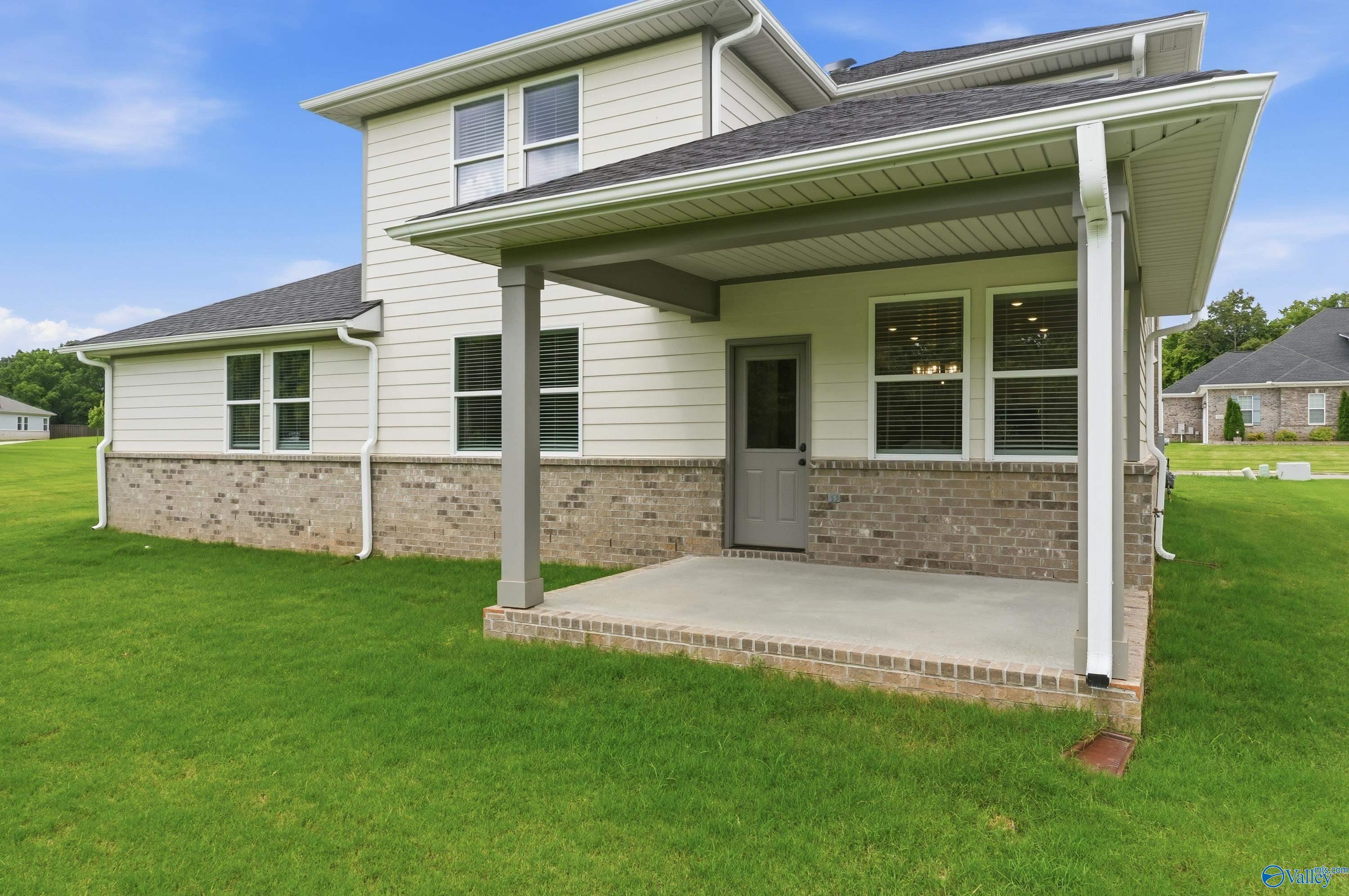 Covered back patio of The Dorado floor plan by Davidson Homes in Riverton Preserve, Huntsville, Alabama.