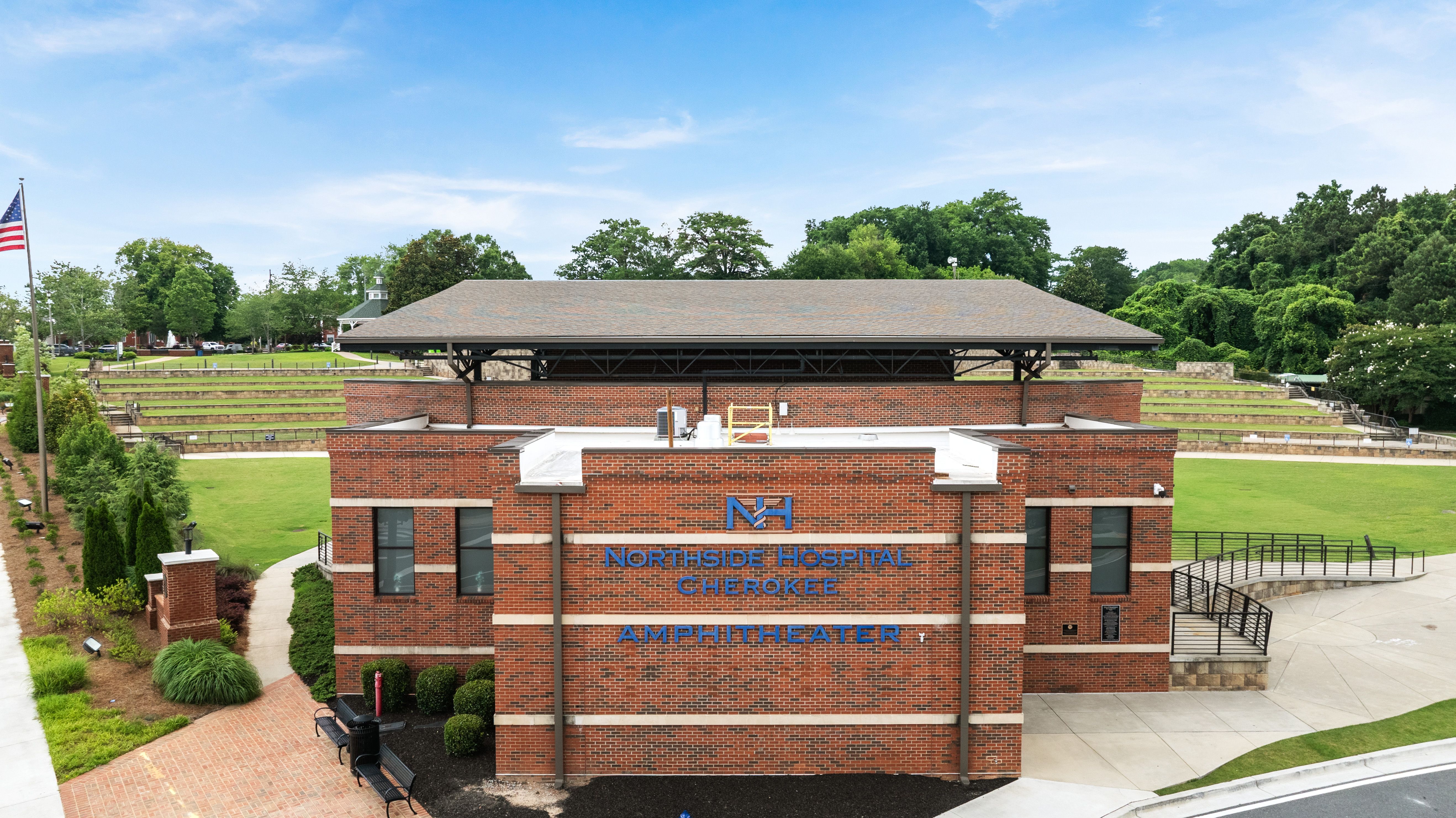 Northside Hospital Cherokee Amphitheater near Grafton Trace community in Woodstock, Georgia, featuring brick architecture.