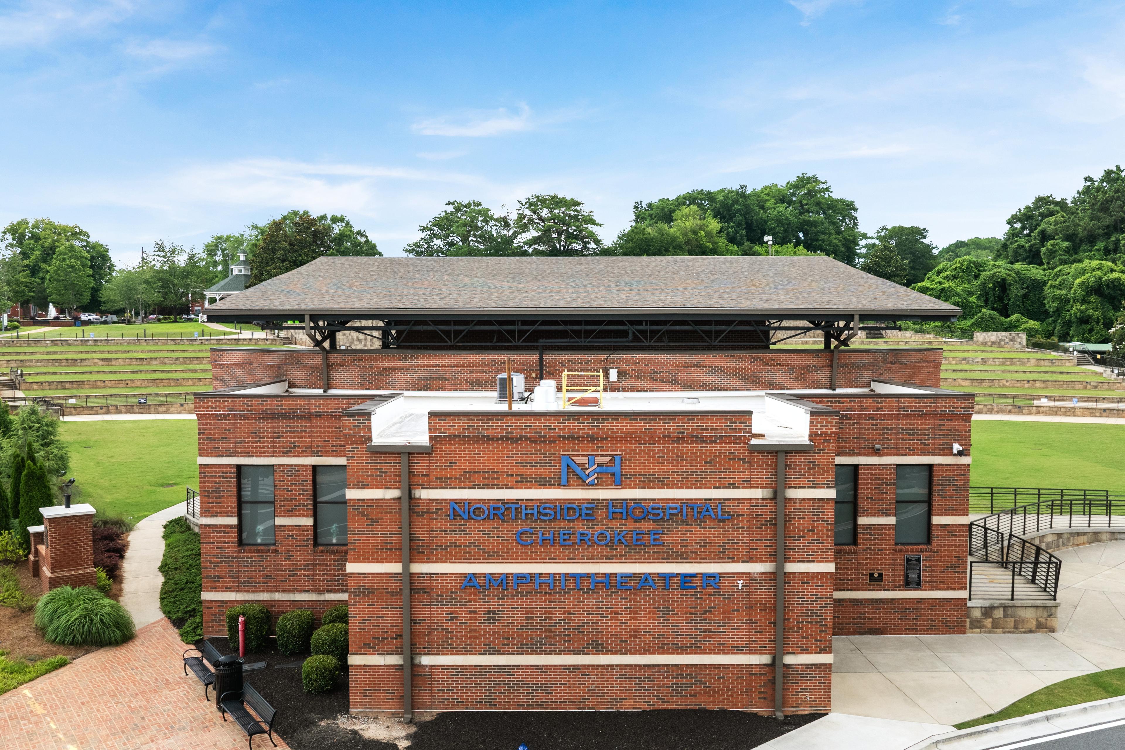Northside Hospital Cherokee Amphitheater near Grafton Trace community in Woodstock, Georgia, featuring brick architecture.