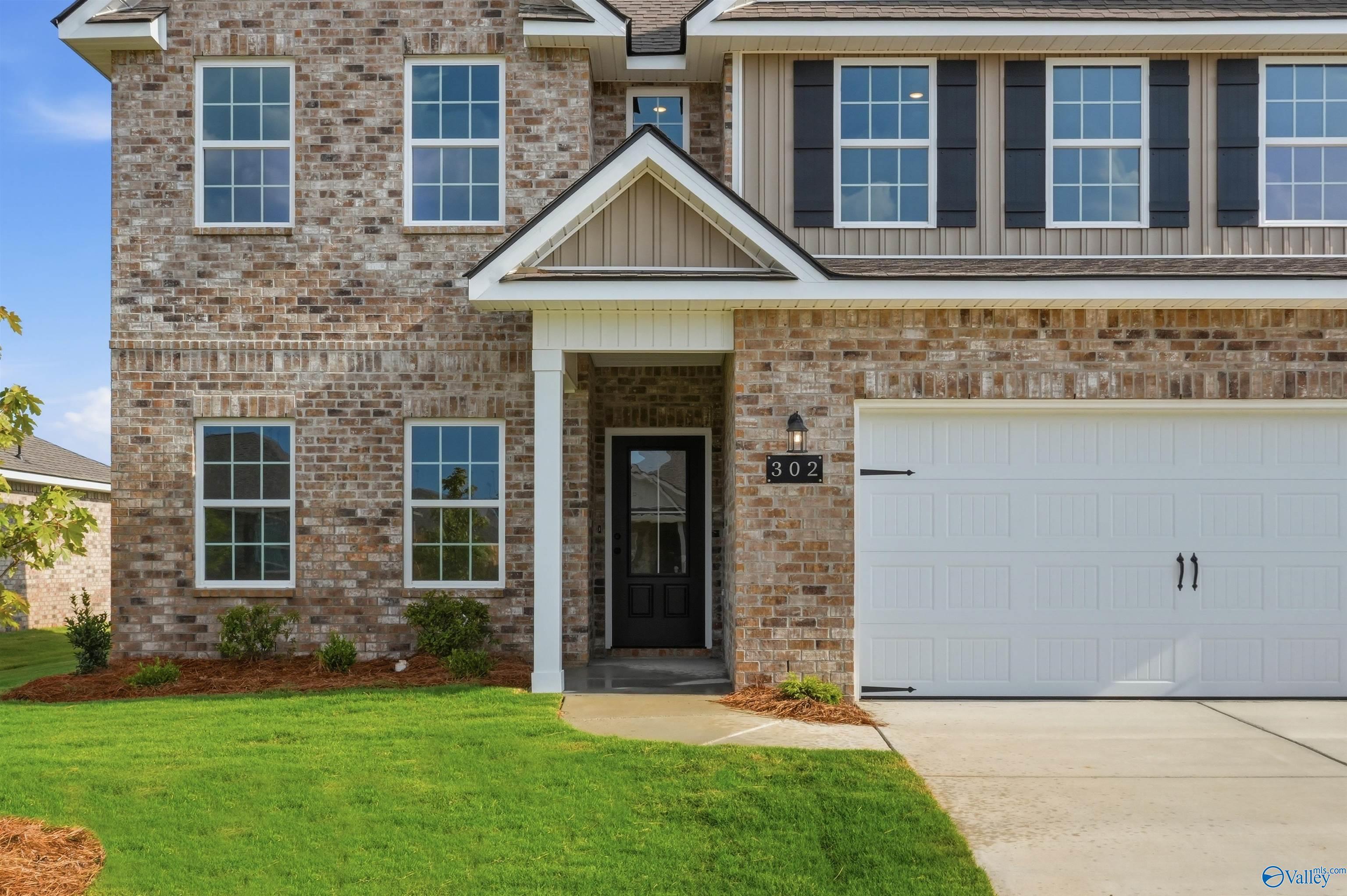 The Shelby A floor plan by Davidson Homes in Clearview, Hazel Green features a 2-story brick exterior and 2-car garage.