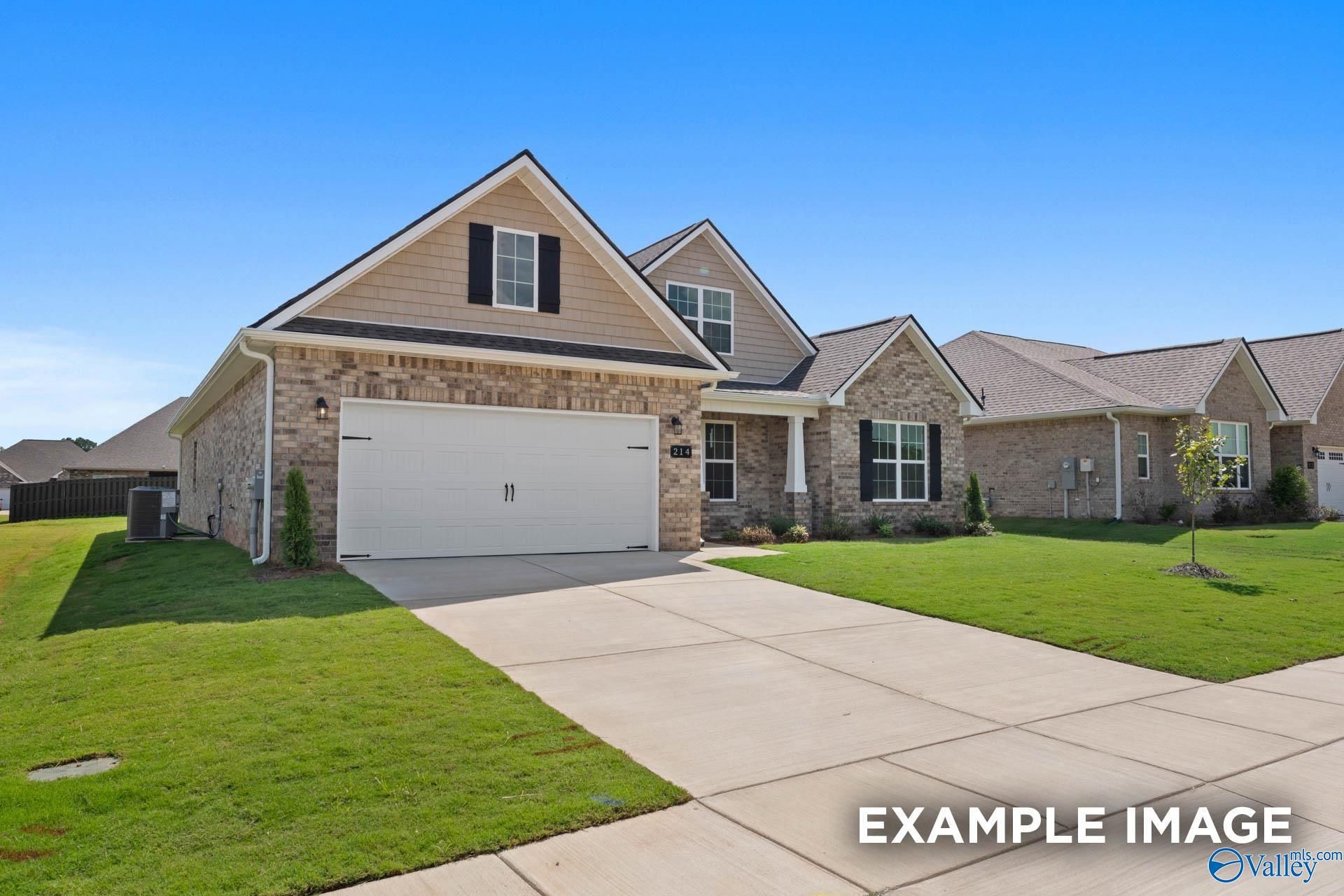 The Rockford B floor plan by Davidson Homes featuring a brick exterior and 2-car garage in Kendall Downs, Toney, Alabama.