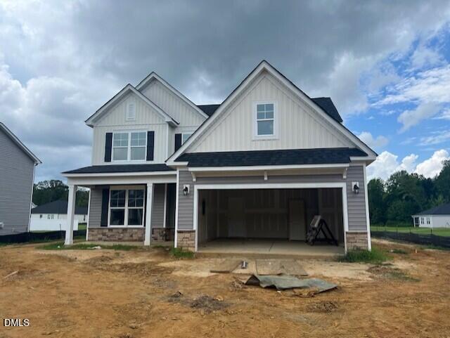 Two-story Ash B floor plan by Davidson Homes with a two-car garage in Retreat at North Main, Lillington, North Carolina.