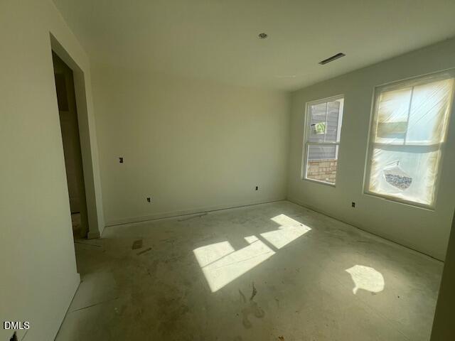 Unfinished bedroom with two windows and natural light in new construction Davidson Homes Magnolia II B, Lillington NC