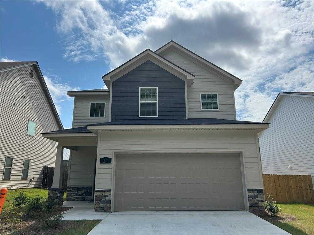 Modern 2-story Bartlett home by Davidson Homes in Summer Vineyard, Phenix City, AL: navy blue siding, 2-car garage, front porch