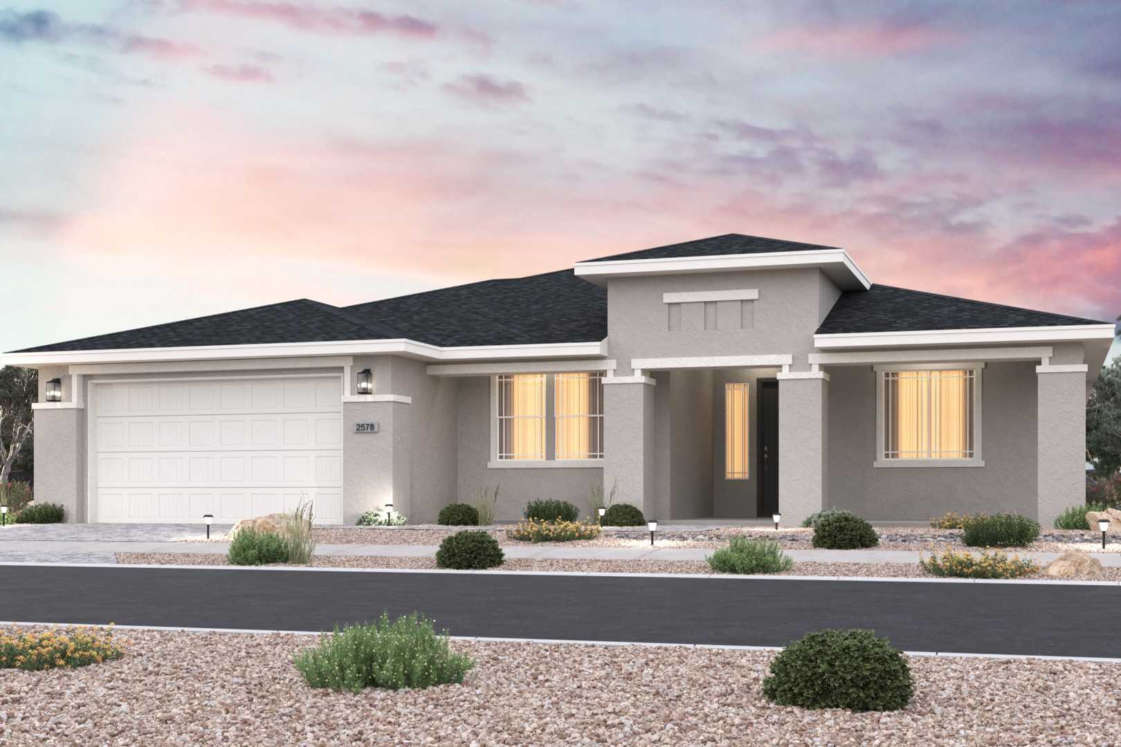 Modern single-story home exterior at Morningstar in Prescott Valley AZ by Evermore Homes with desert landscape and sunset sky