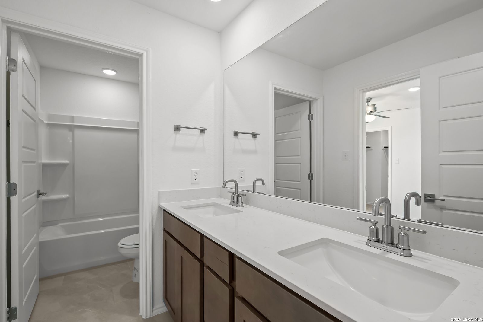 Elegant master bathroom with double vanity, soaking tub, walk-in shower in Davidson Homes The Sequoia B, Comanche Ridge, San Antonio