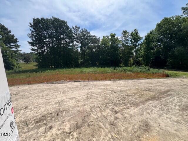 Wooded homesite for new construction by Davidson Homes in Wellers Knoll, Lillington, North Carolina.