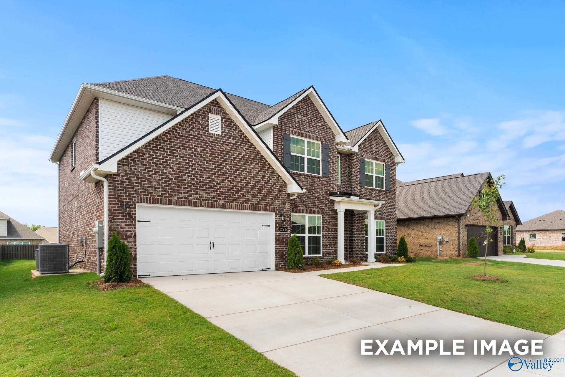 Two-story brick home with 2-car garage, gabled roof, and front porch in Creekside, Harvest, Alabama - Davidson Homes The Madison A