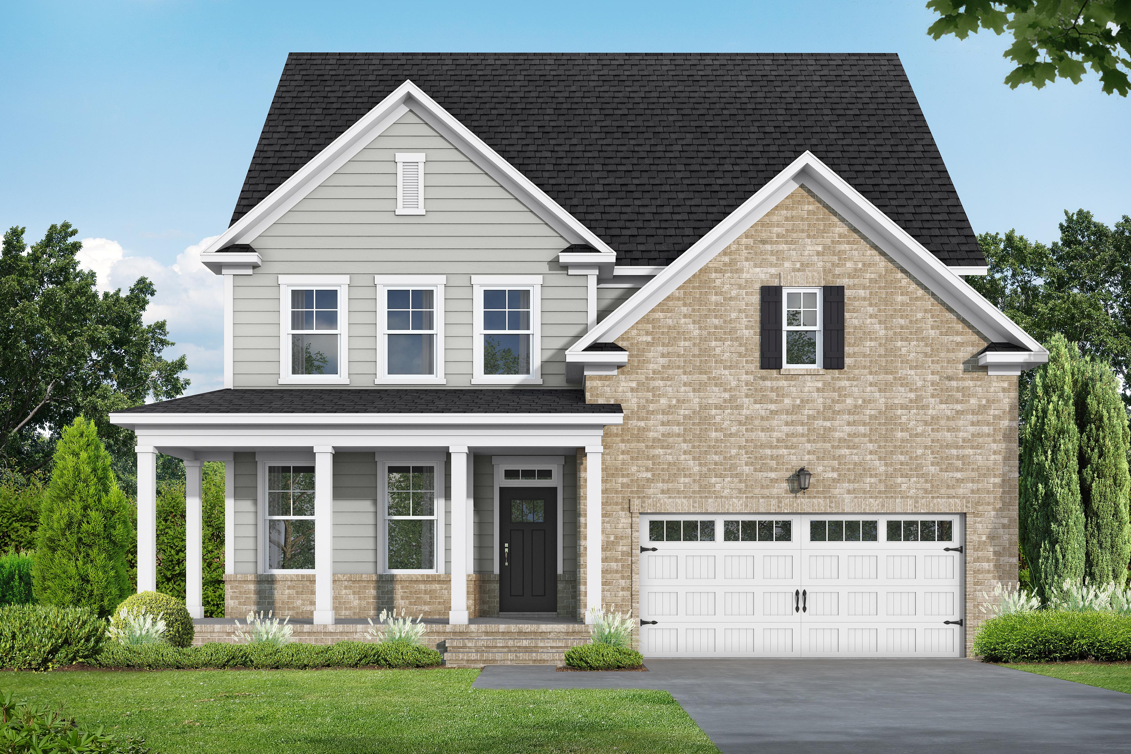 Two-story The Hickory II elevation with gray vinyl siding, brick accents, covered porch, two-car garage, and lush landscaping in Holly Springs NC