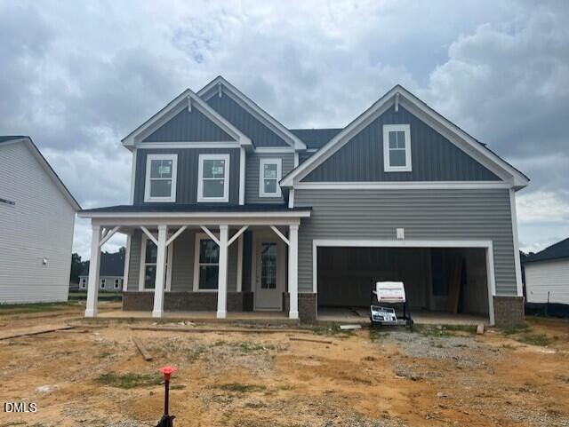 Two-story Hickory II B home by Davidson Homes with a two-car garage in Retreat at North Main, Lillington, North Carolina.