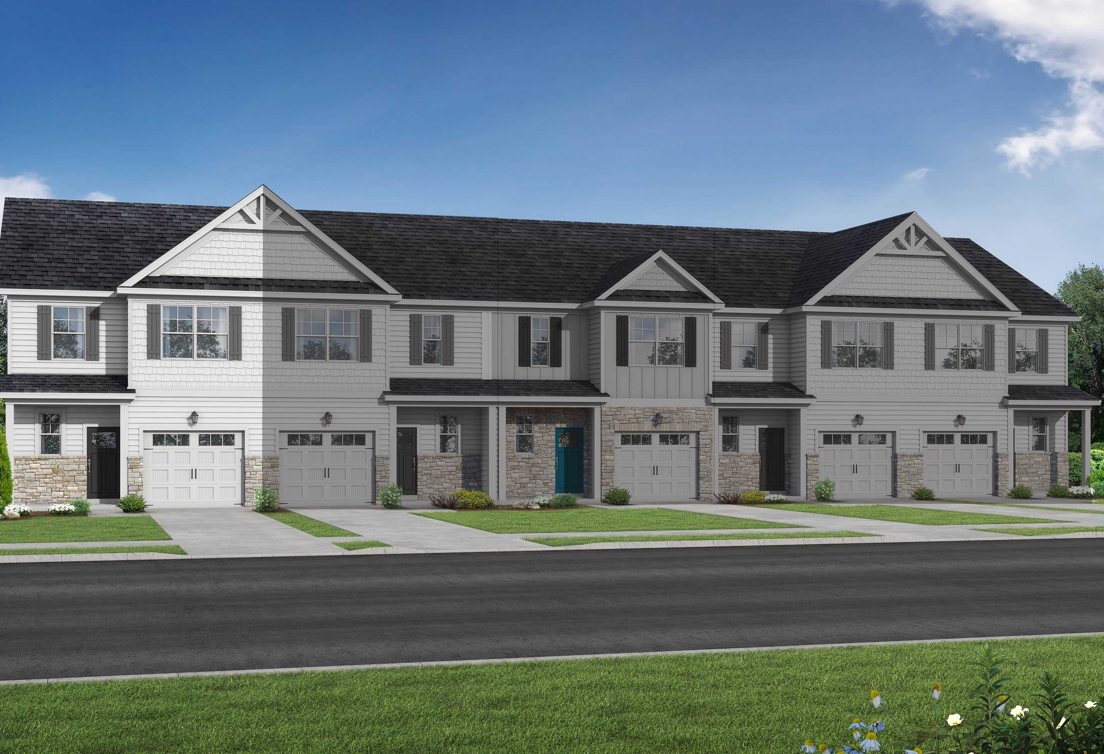 Row of four 2-story The Warren townhomes in Fuquay-Varina, NC, with white siding, dark gabled roofs, 1-car garages, porches, and lush green landscaping