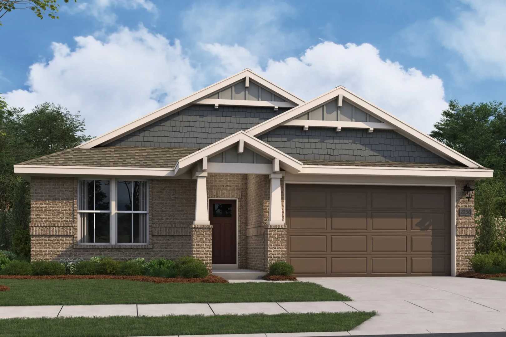 The Orion single-story home exterior by Evermore Homes featuring brick facade, gabled roof, covered porch, and 2-car garage in Cusseta, Alabama