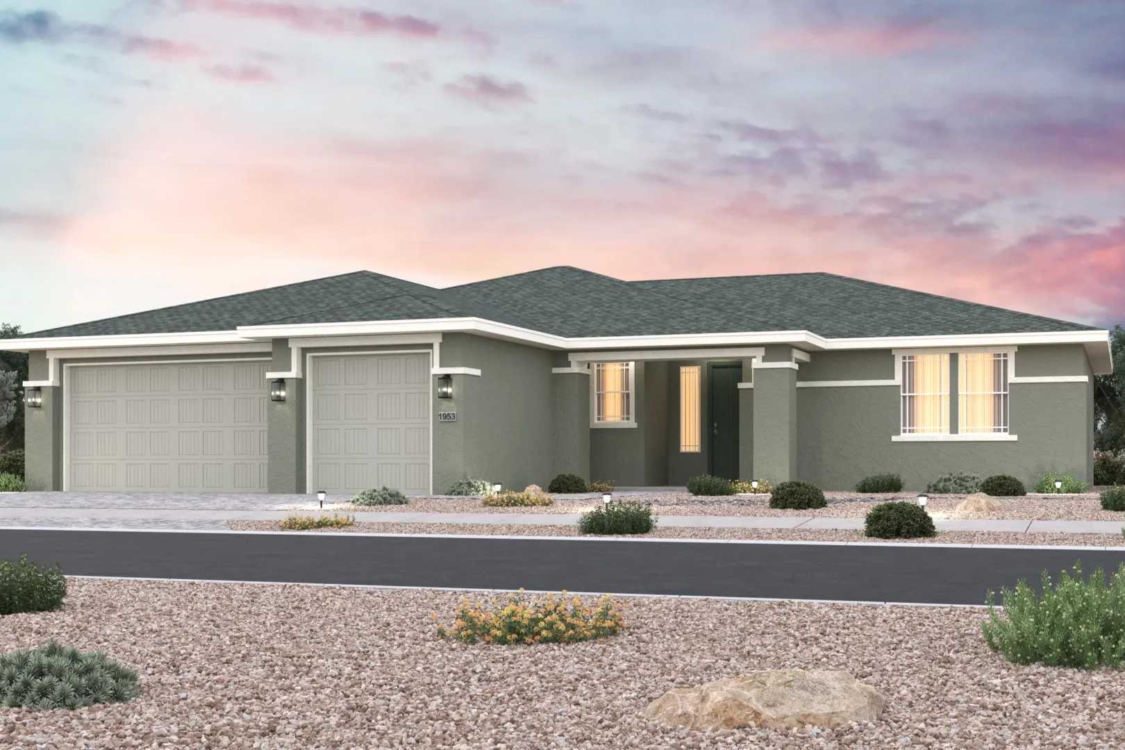 Contemporary single-story home at Morningstar in Prescott Valley AZ with gray stucco exterior, two-car garage, and desert landscaping