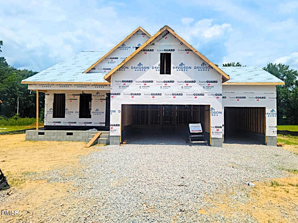 New construction of The Birch II A floor plan by Davidson Homes featuring a 3-car garage in Tobacco Road, Angier, NC.