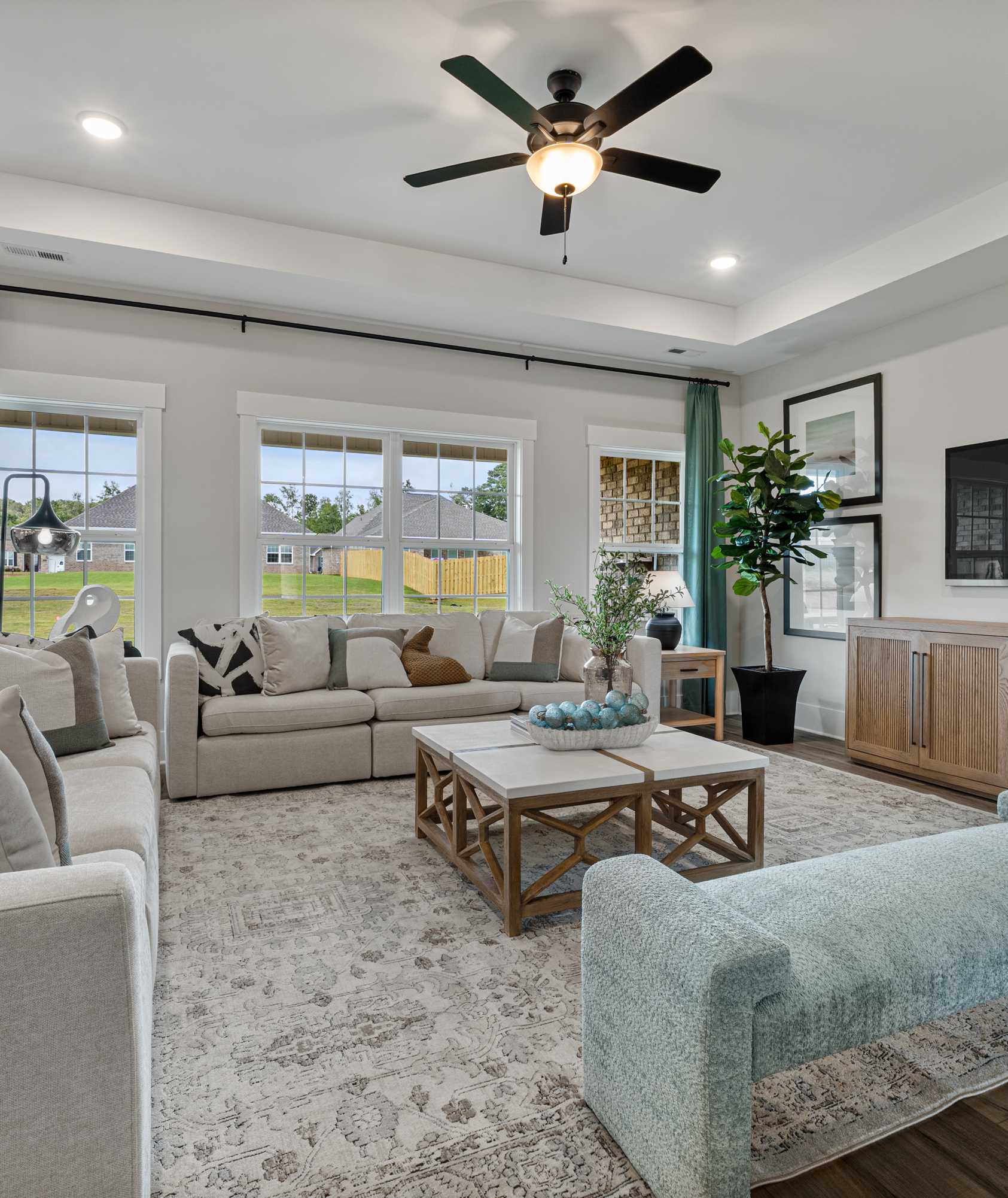 gracious kitchen with walk-in pantry and large center island by Davidson Homes in Decatur, AL