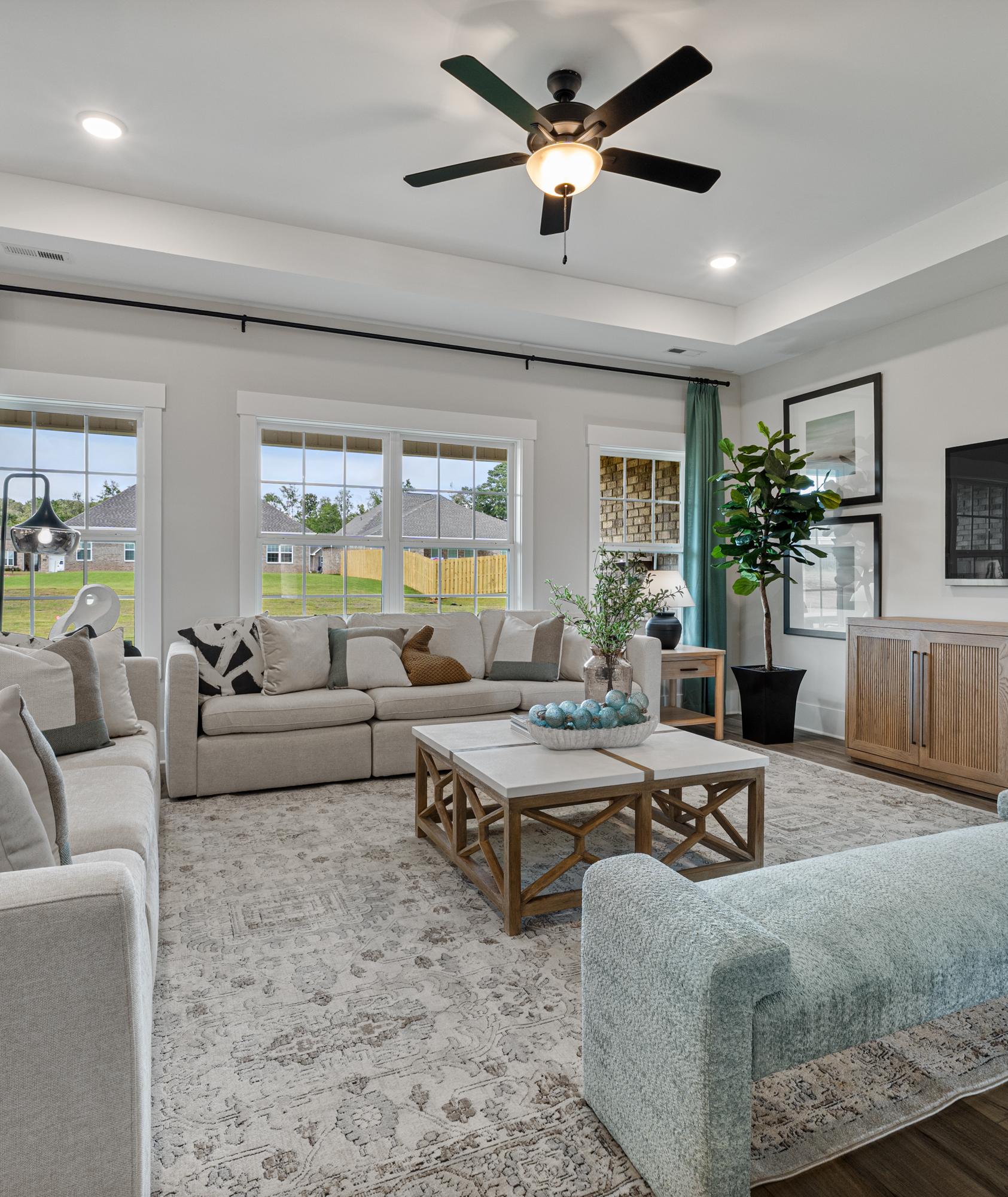 gracious kitchen with walk-in pantry and large center island by Davidson Homes in Decatur, AL