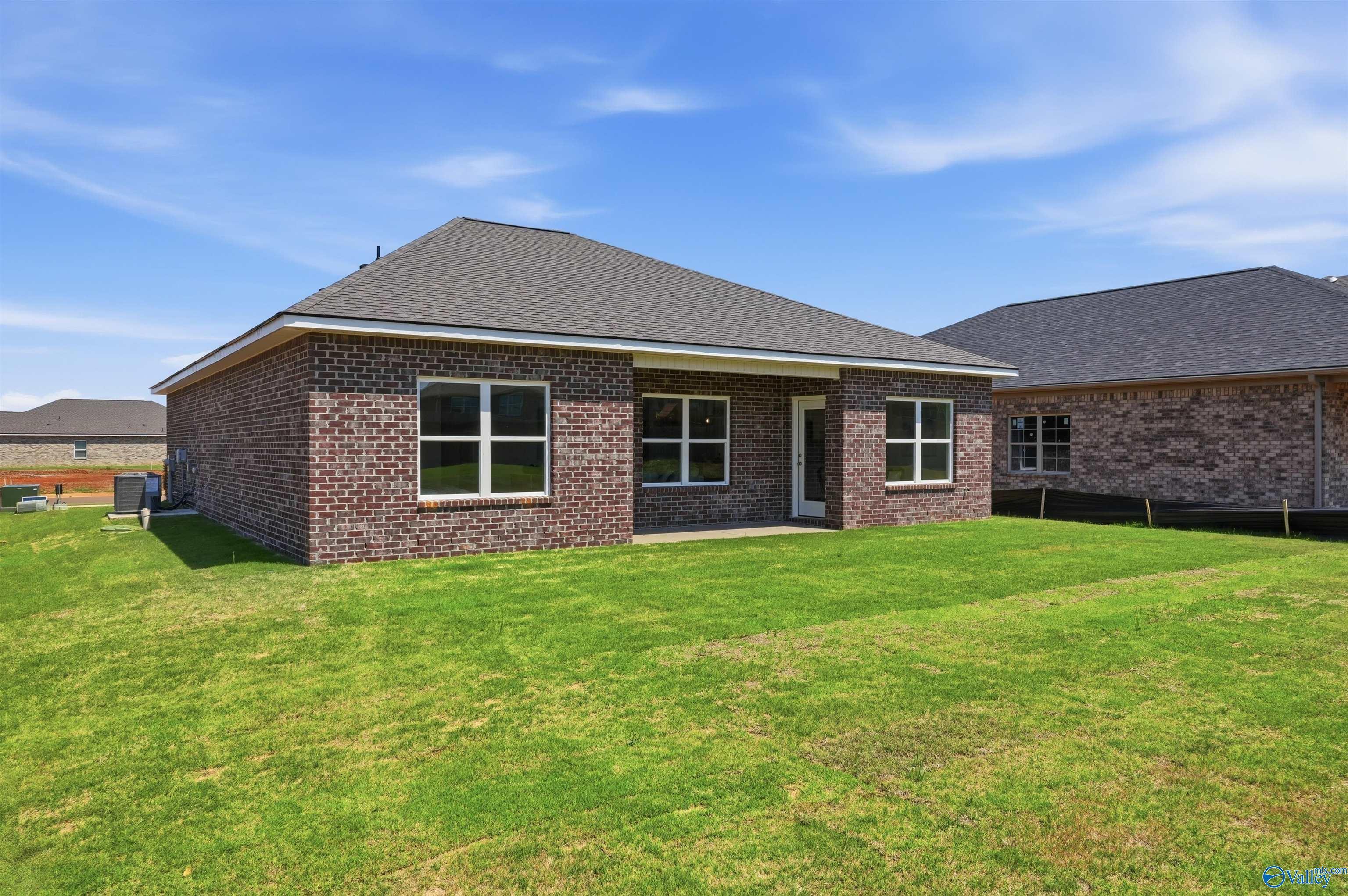 Back exterior view of The Franklin C floor plan by Davidson Homes in Lynn Meadows, Meridianville, Alabama.