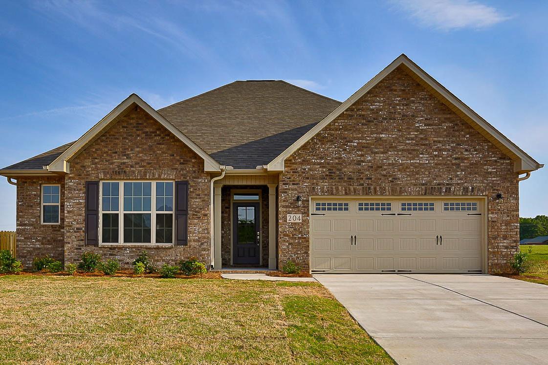The Montgomery single-story brick home elevation with 2-car garage, master suite, Davidson Homes design in Meridianville Alabama