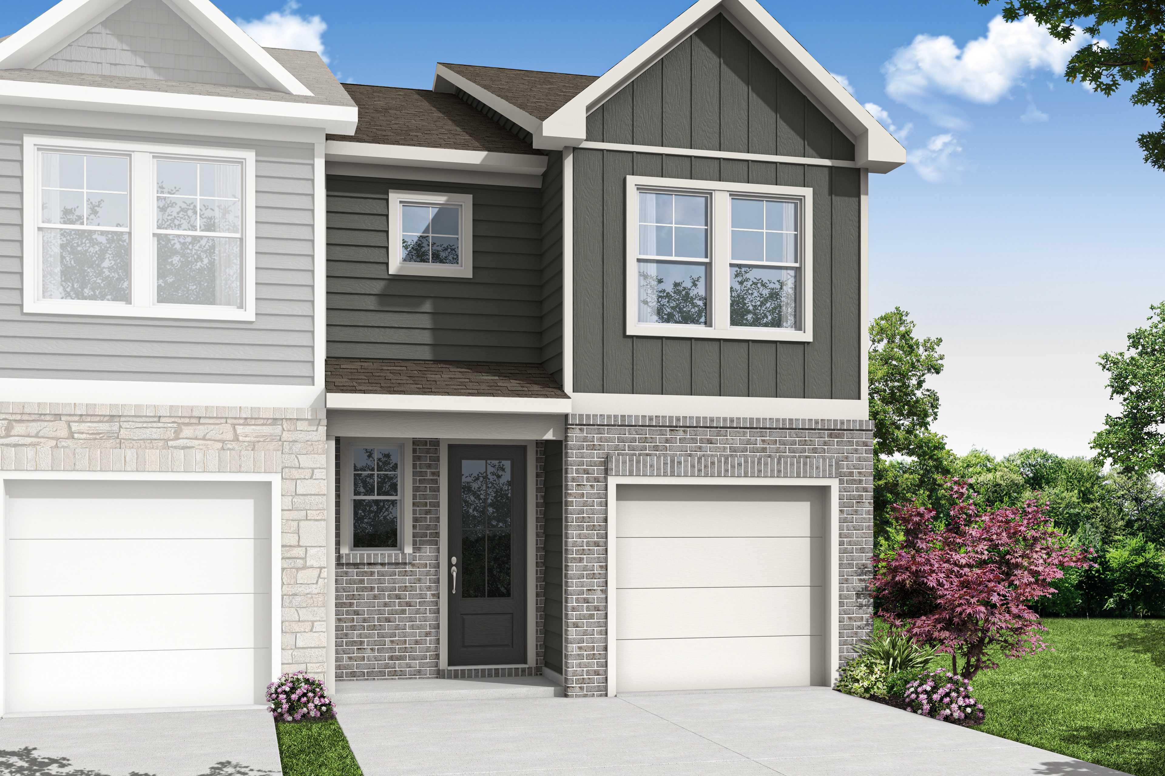Two-story Durant C multi-family duplex elevation with gray siding, brick accents, attached garages, and upper windows in Emerson, Georgia