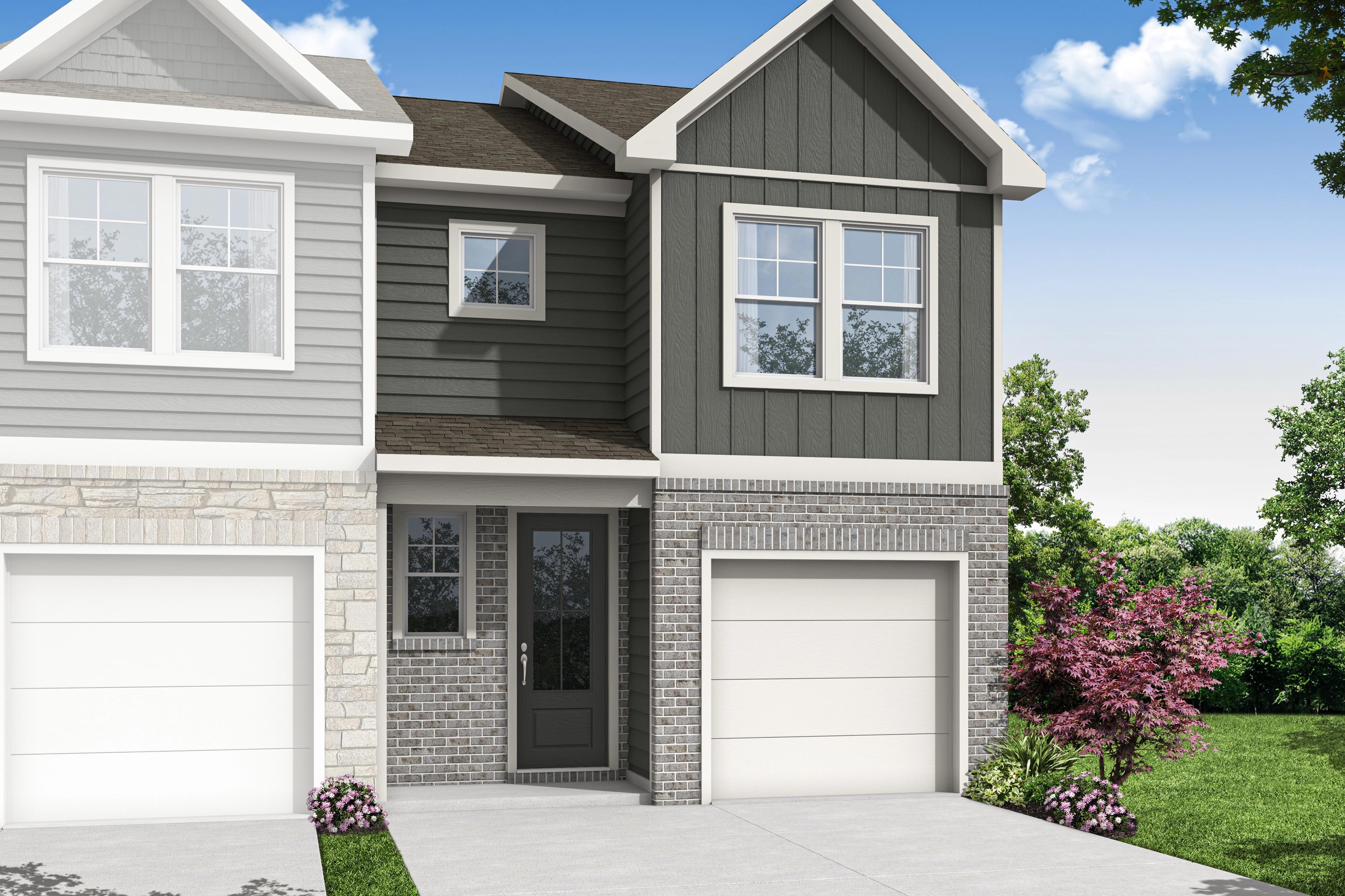 Two-story Durant C multi-family duplex elevation with gray siding, brick accents, attached garages, and upper windows in Emerson, Georgia