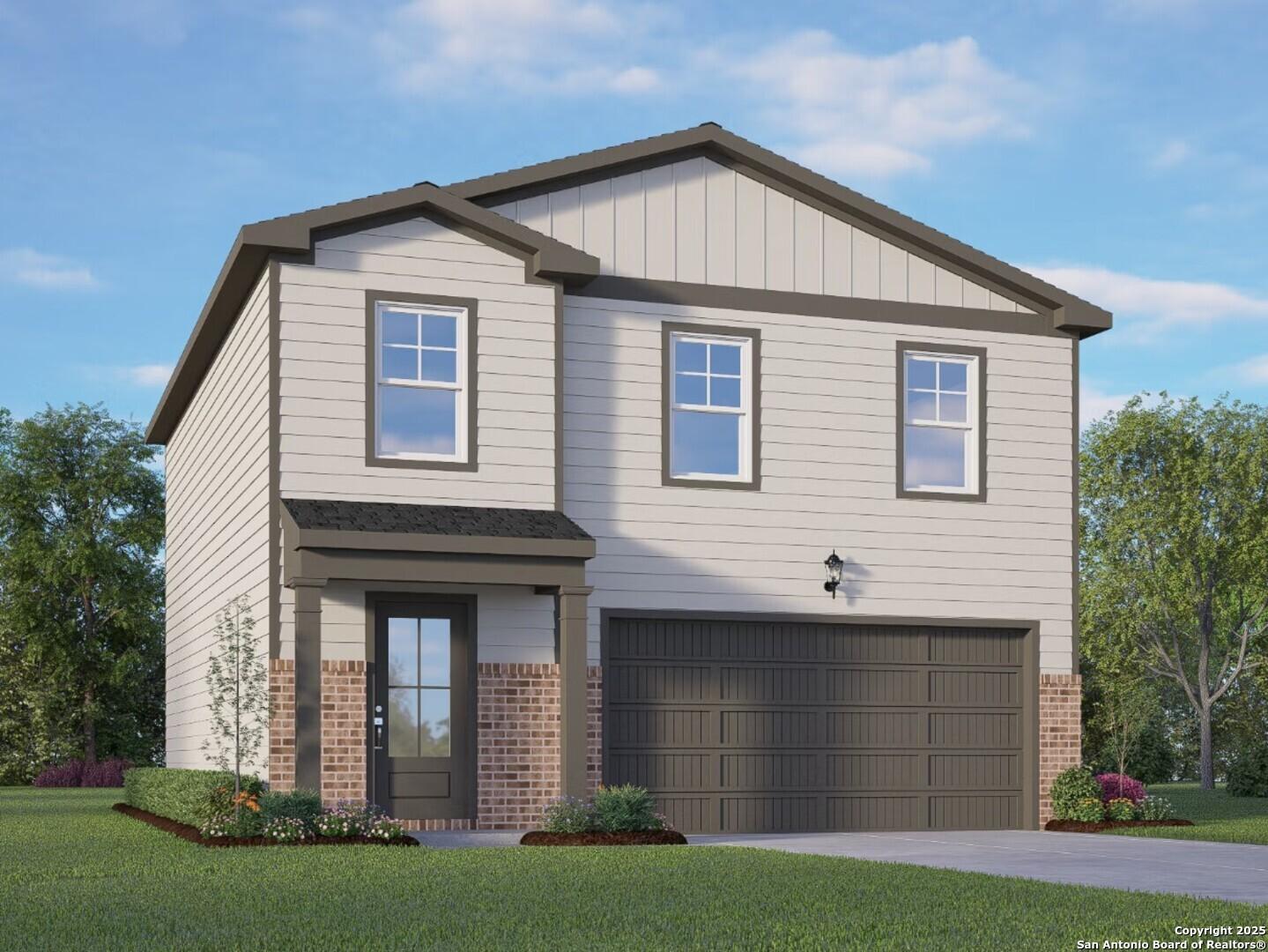 Modern two-story 4-bedroom home with beige siding, brick accents, 2-car garage, and landscaped yard in Applewhite Meadows, San Antonio, Texas
