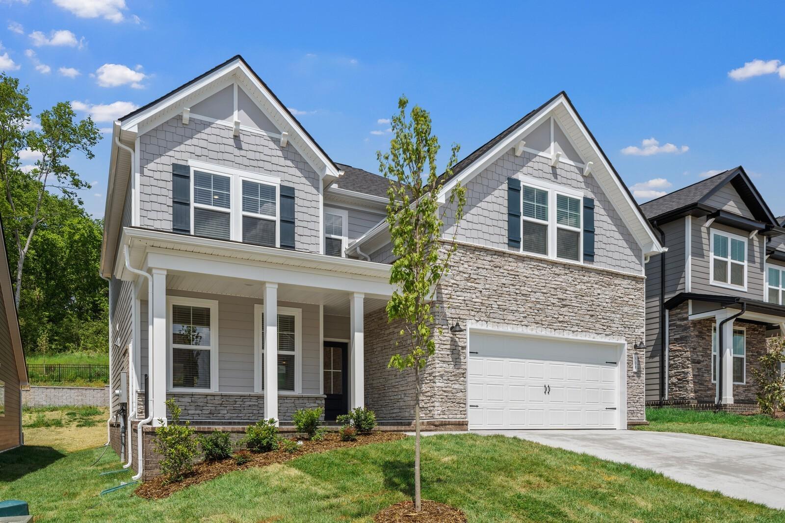 Two-story Willow floor plan home by Davidson Homes with 2-car garage in Woods Crossing, Gallatin, Tennessee.