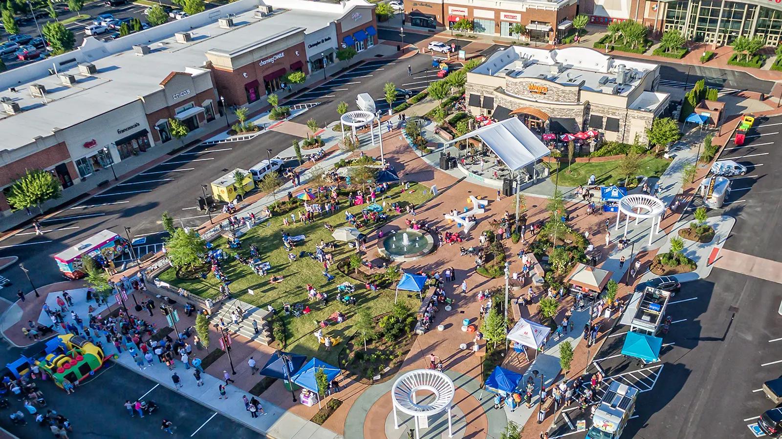 Aerial view of community event at Jackson Village in Hendersonville, Tennessee with live music and outdoor gathering space.