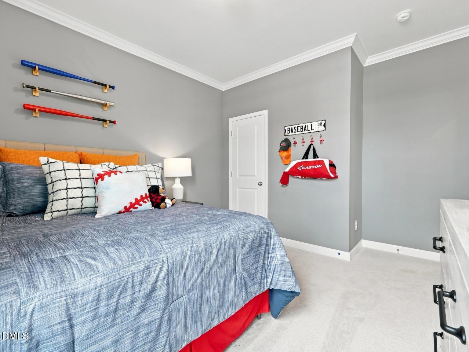 Baseball-themed bedroom in The Daphne C floor plan at Woodland Crossing, Zebulon, North Carolina.