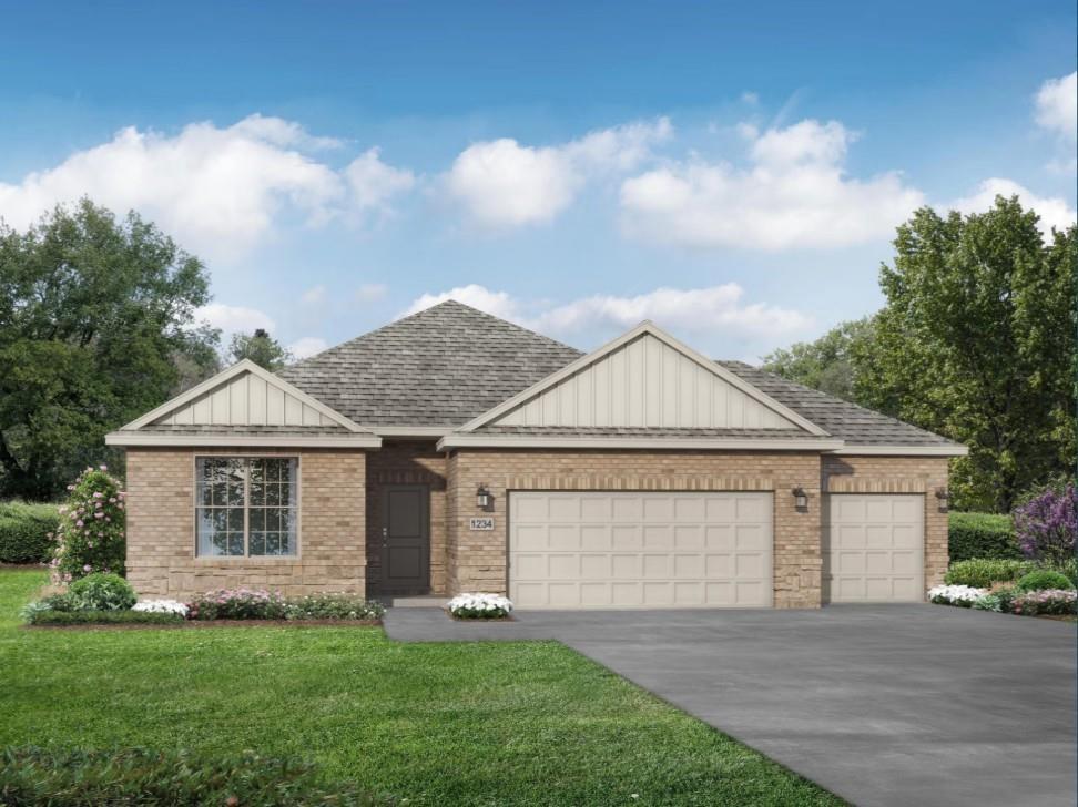 Brick 1-story home with 3-car garage, gabled roof, and landscaped front yard in River Ranch Meadows, Dayton, Texas