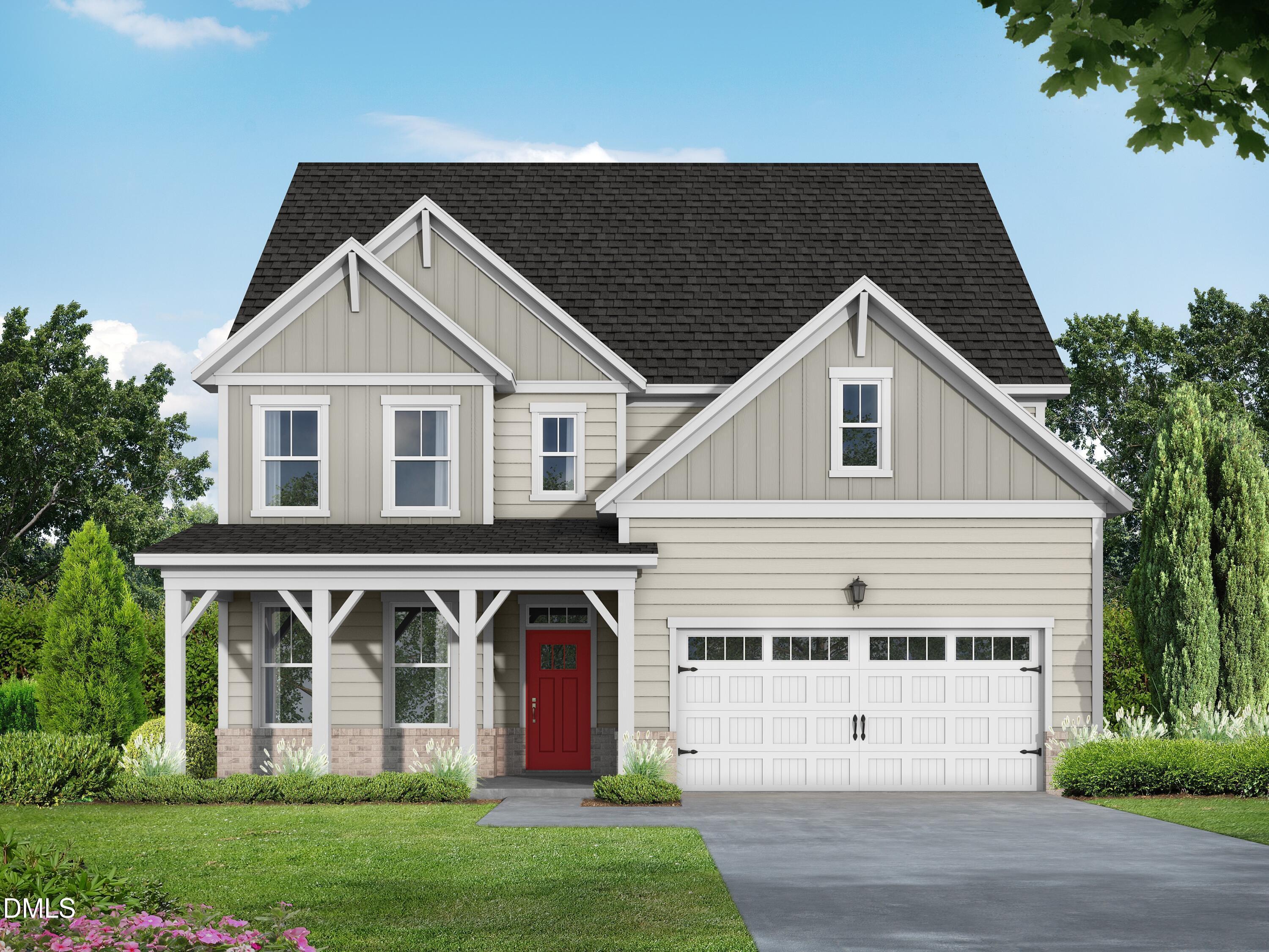 Two-story Hickory II B floor plan by Davidson Homes with a red front door and 2-car garage in Woodland Crossing, Zebulon, NC.