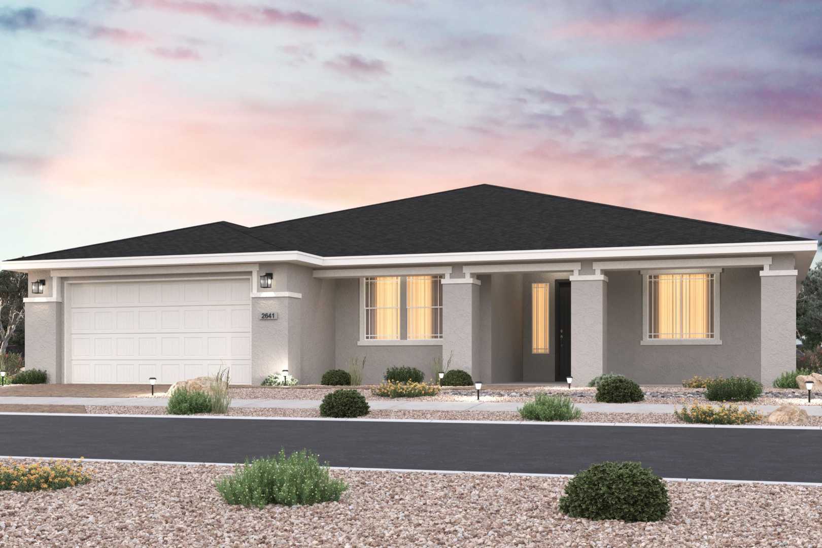 Sunset elevation of The Sunrise II C single-story home featuring beige siding, dark roof, 2-car garage, and desert landscaping in Prescott AZ