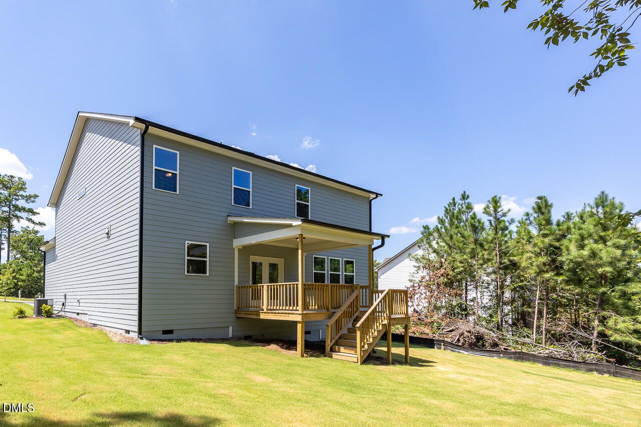 Two-story Davidson Homes Hickory II B floor plan in Montrose, Aberdeen featuring a back deck and private wooded yard.