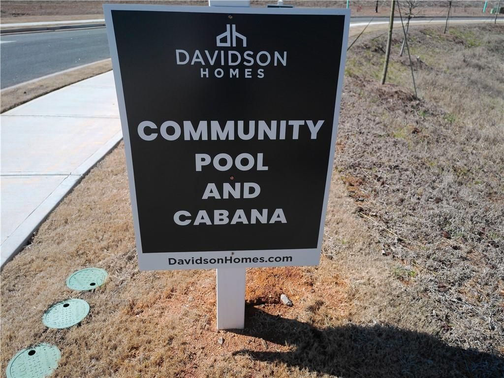 Davidson Homes community pool and cabana sign in Lake Shore, Winder, Georgia development