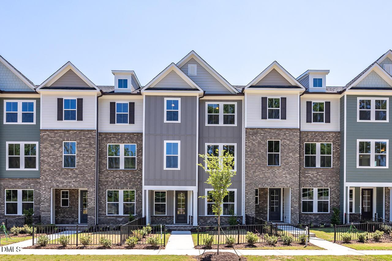 3-story townhome exteriors for The Mitchell floor plan by Davidson Homes in Camden Park, Knightdale, North Carolina.