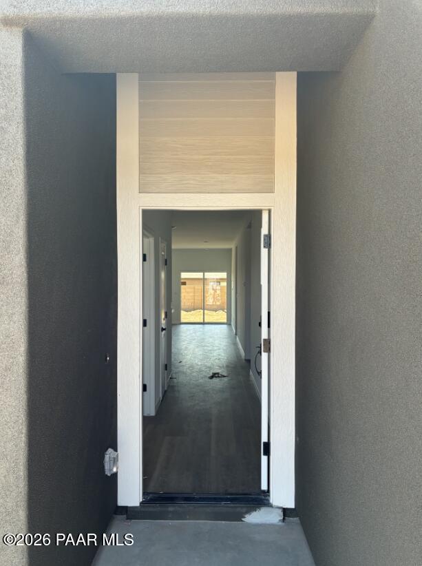 Open front entryway leading to long hallway in The Coronado A floor plan at South Ranch, Prescott, Arizona.