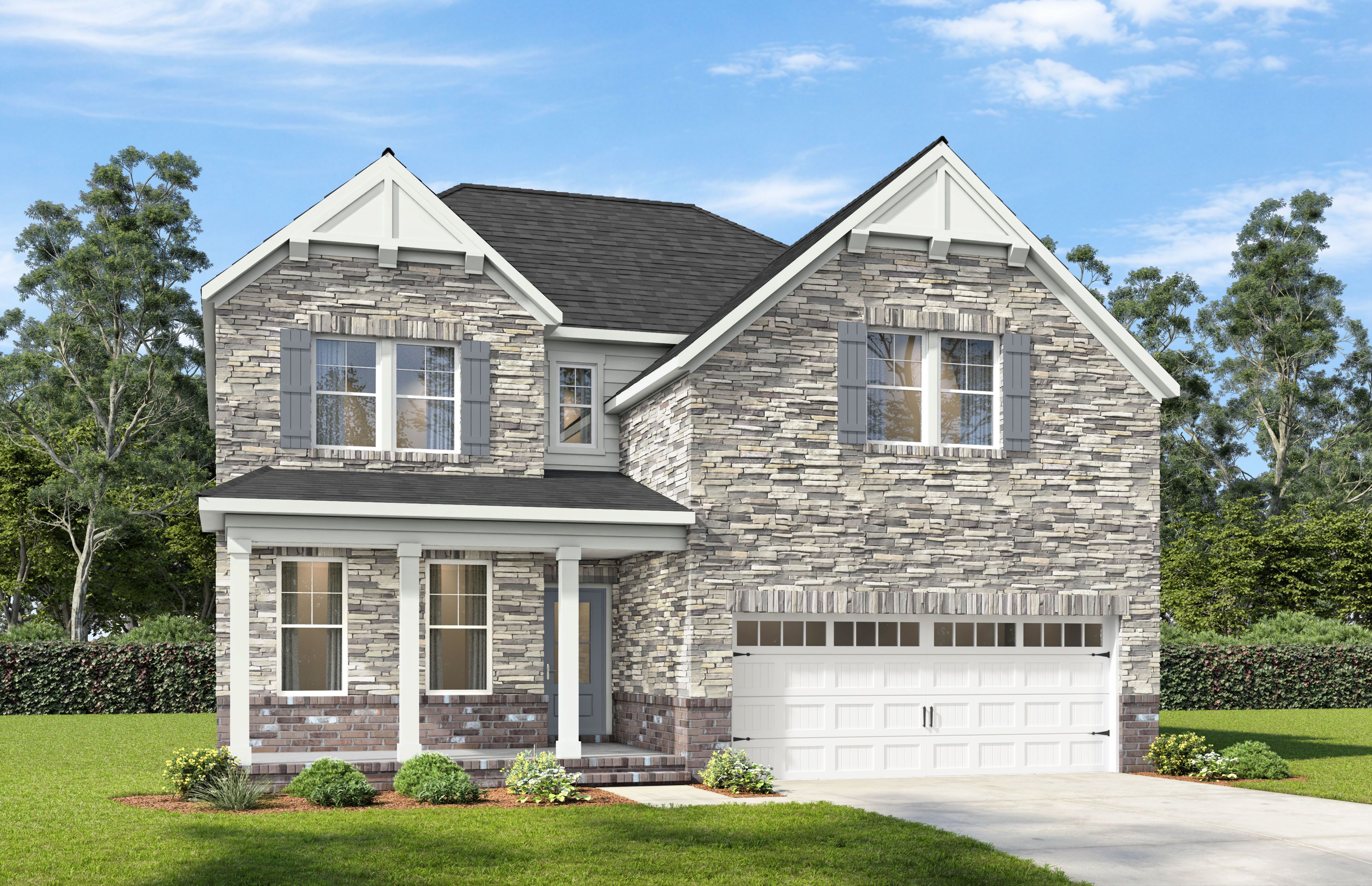 Two-story brick and stone elevation of The Willow A-BF by Davidson Homes in Mt. Juliet, TN with 2-car garage