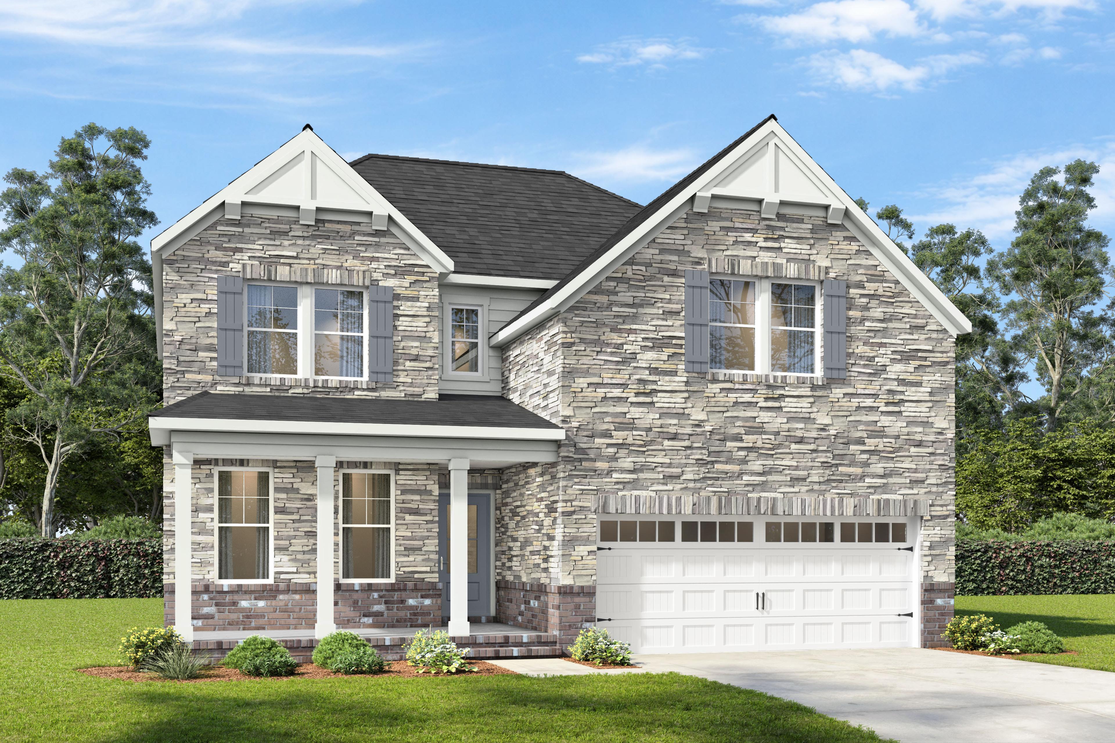 Two-story brick and stone elevation of The Willow A-BF by Davidson Homes in Mt. Juliet, TN with 2-car garage