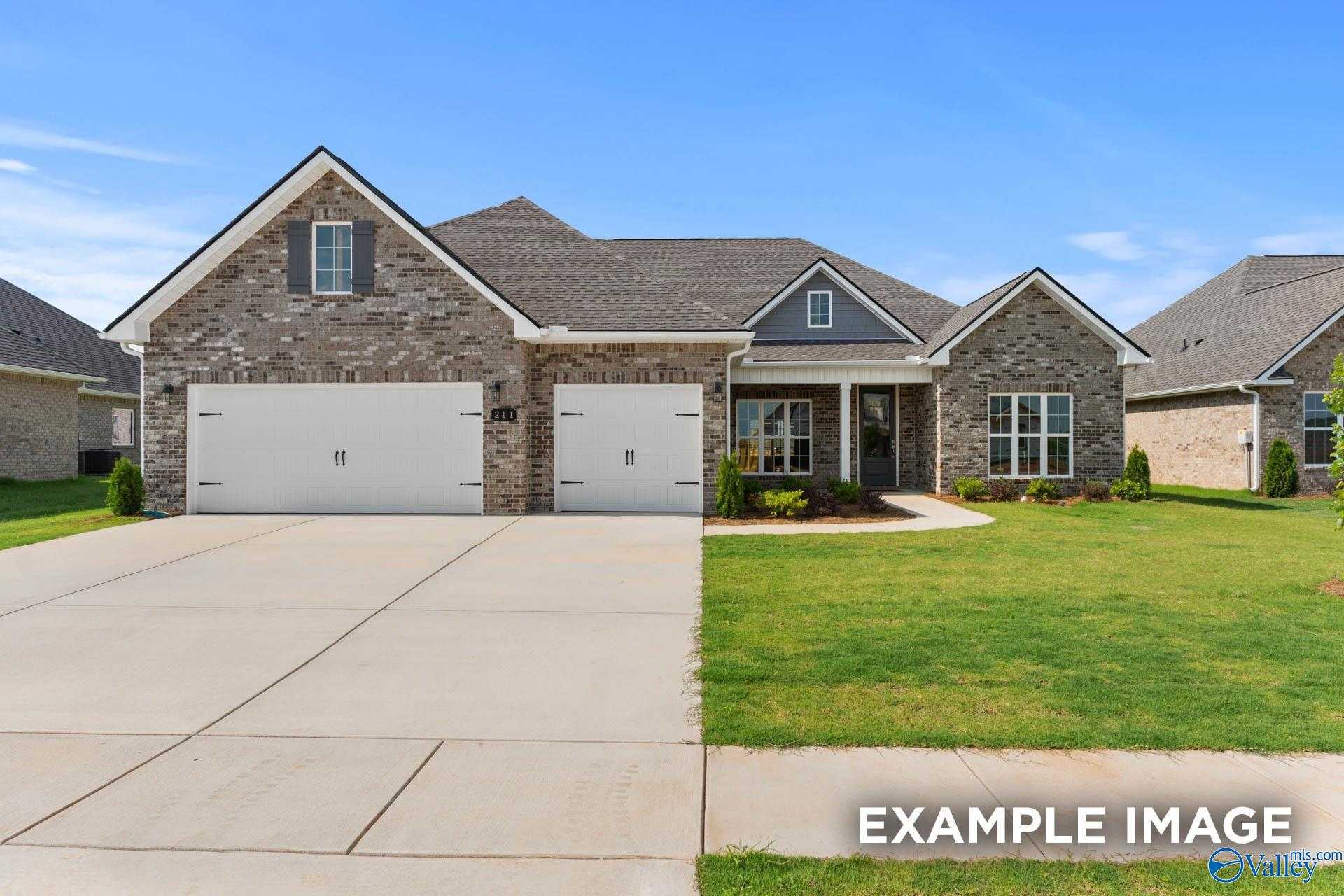 Modern single-story brick home with 2-car garage, covered porch, and landscaped yard in Briercreek, Meridianville, Alabama - Davidson Homes The Finleigh