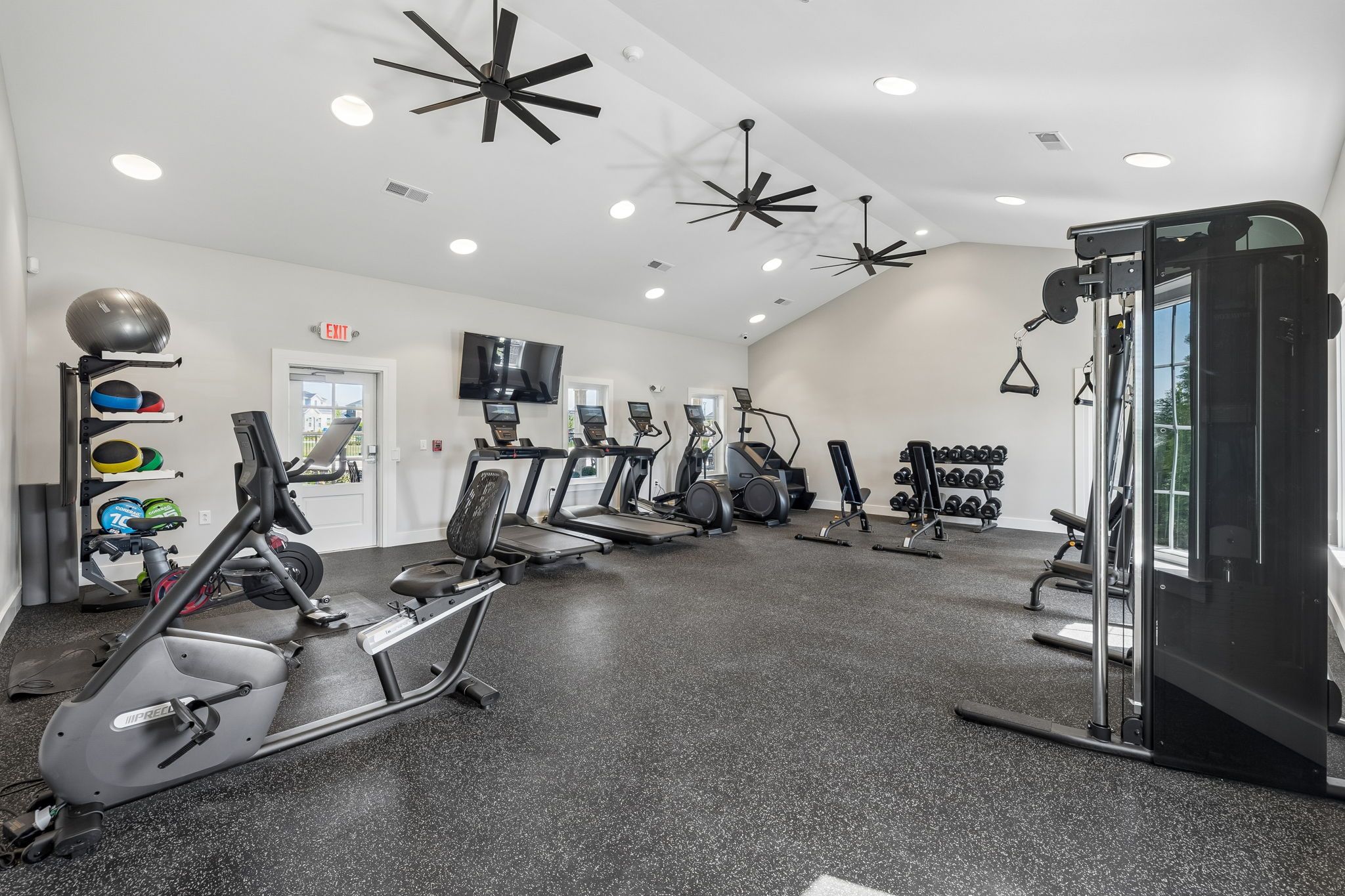 Community fitness center at Bradshaw Farms in Mt. Juliet, TN with modern cardio equipment and free weights.