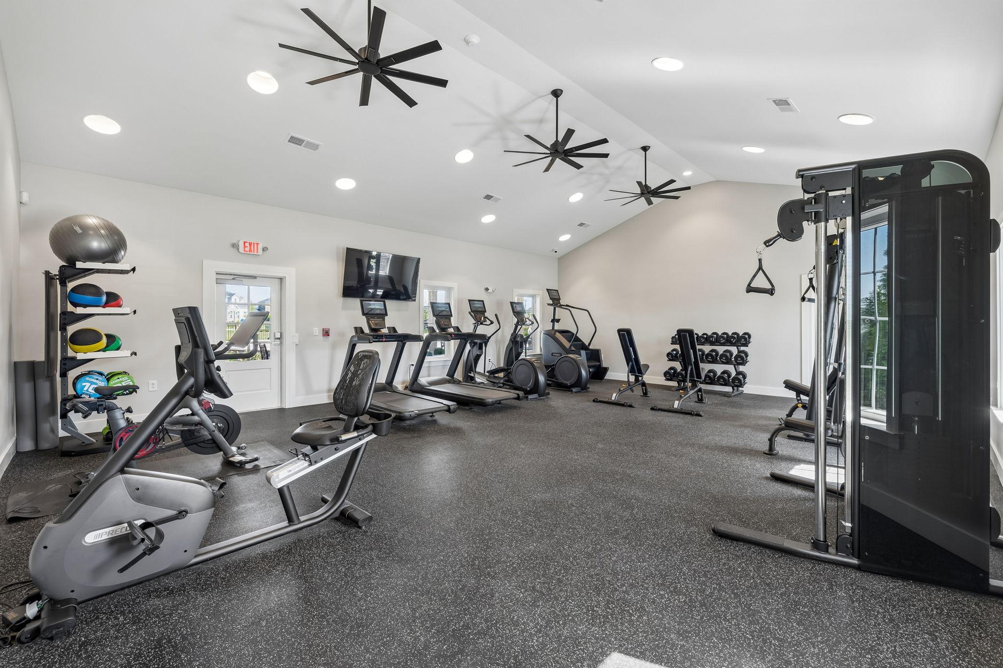 Community fitness center at Bradshaw Farms in Mt. Juliet, TN with modern cardio equipment and free weights.