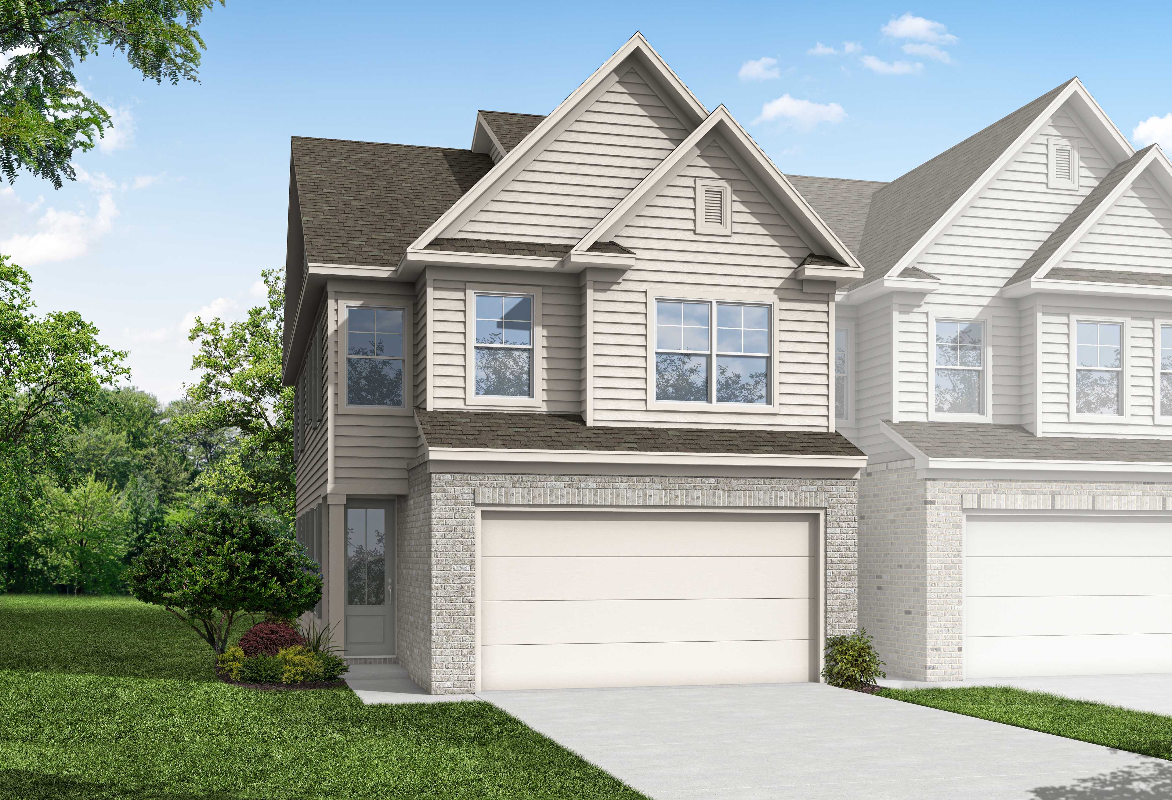 Two-story Chatham A multi-family home elevation with attached 2-car garages, beige siding, brick accents, and lush landscaping in Cumming, GA