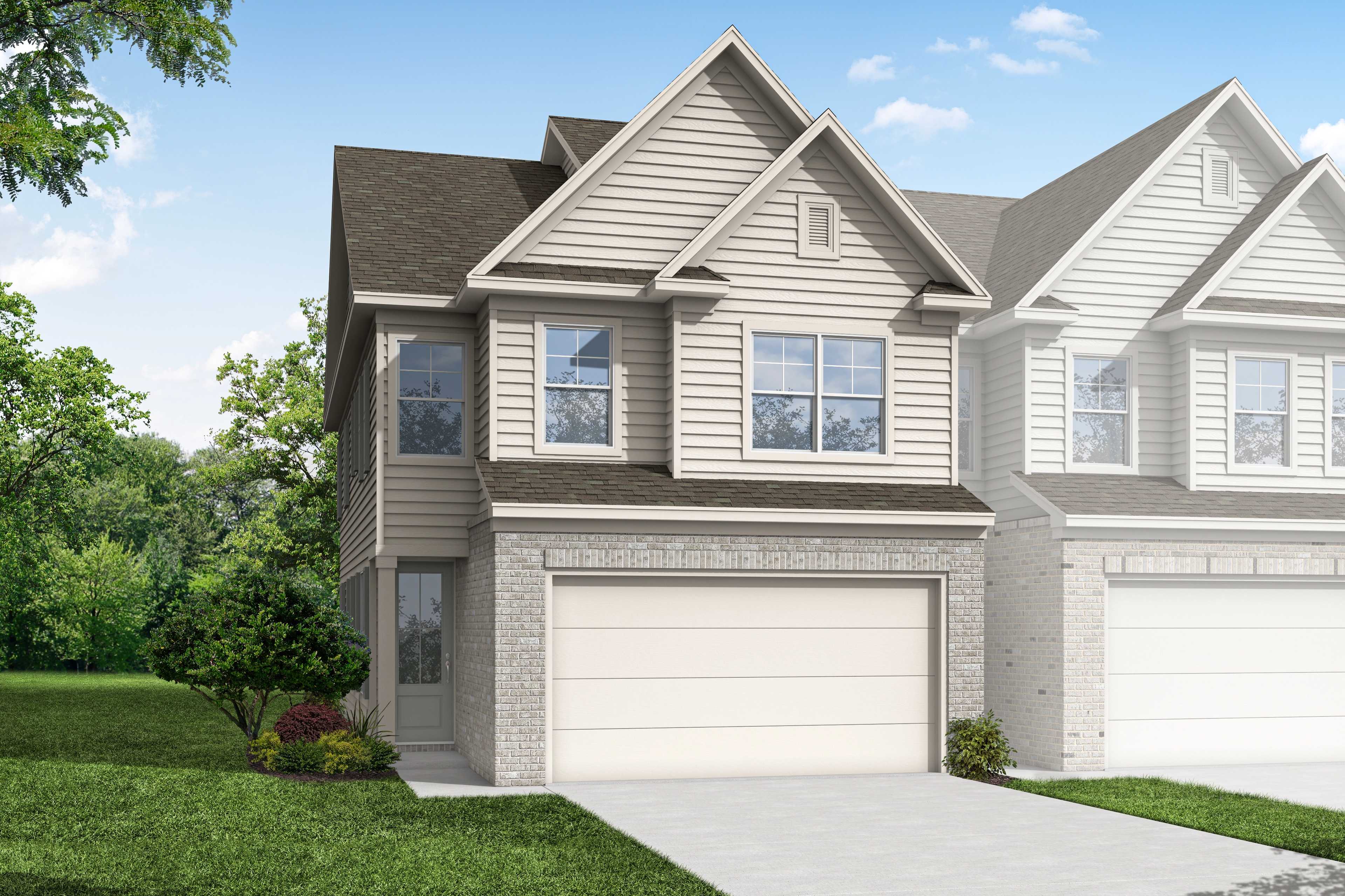 Two-story Chatham A multi-family home elevation with attached 2-car garages, beige siding, brick accents, and lush landscaping in Cumming, GA